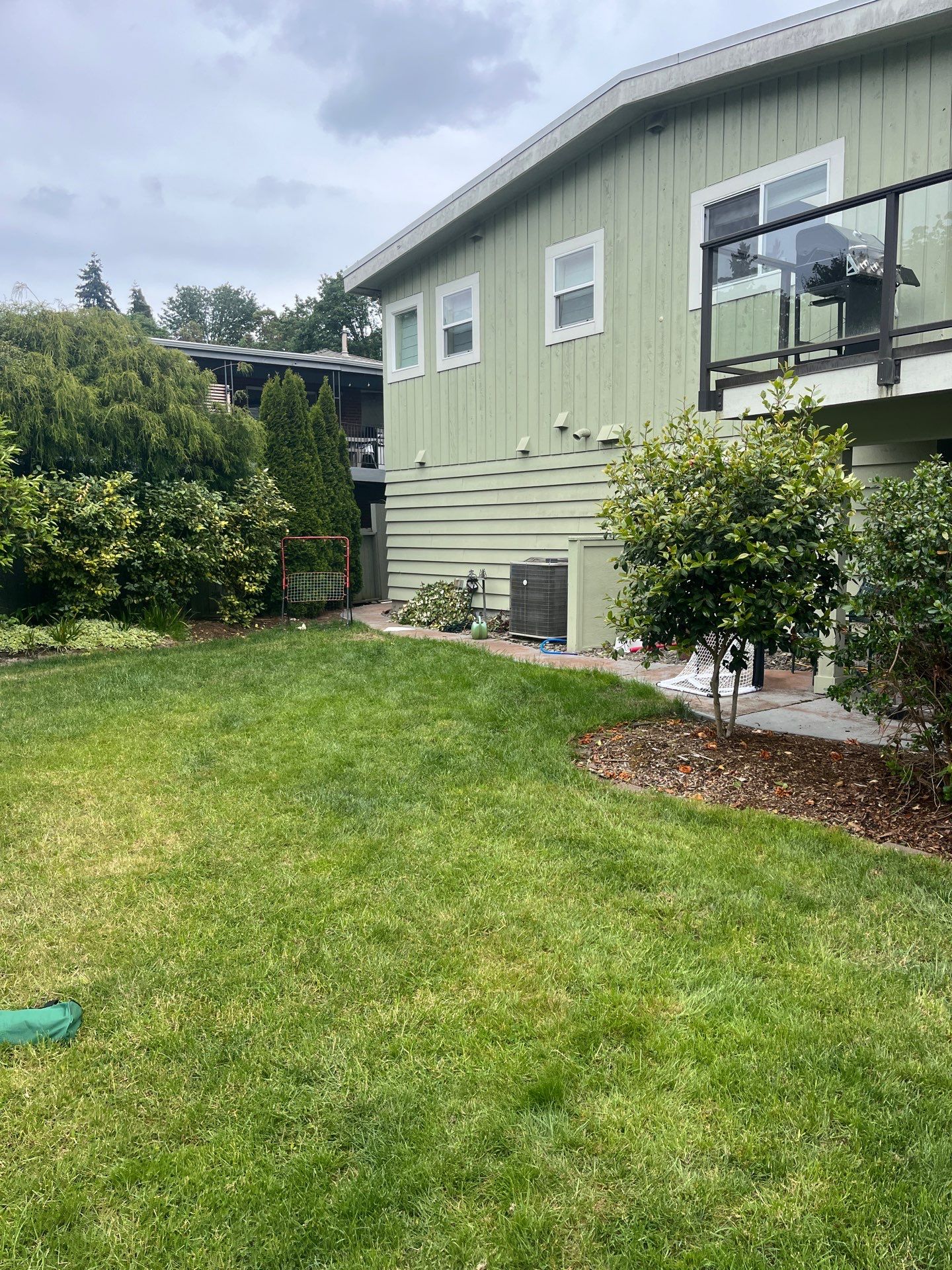 Ashley | Concrete Back Patio by Jireh Asphalt & Concrete Inc 