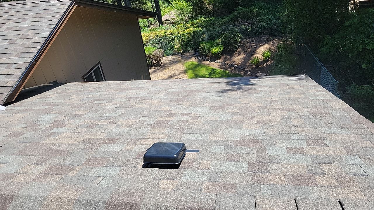 Residential Roofing Installation using Malarkey Highlander with GAF 60mil TPO by Orezona Building & Roofing Company, Inc.