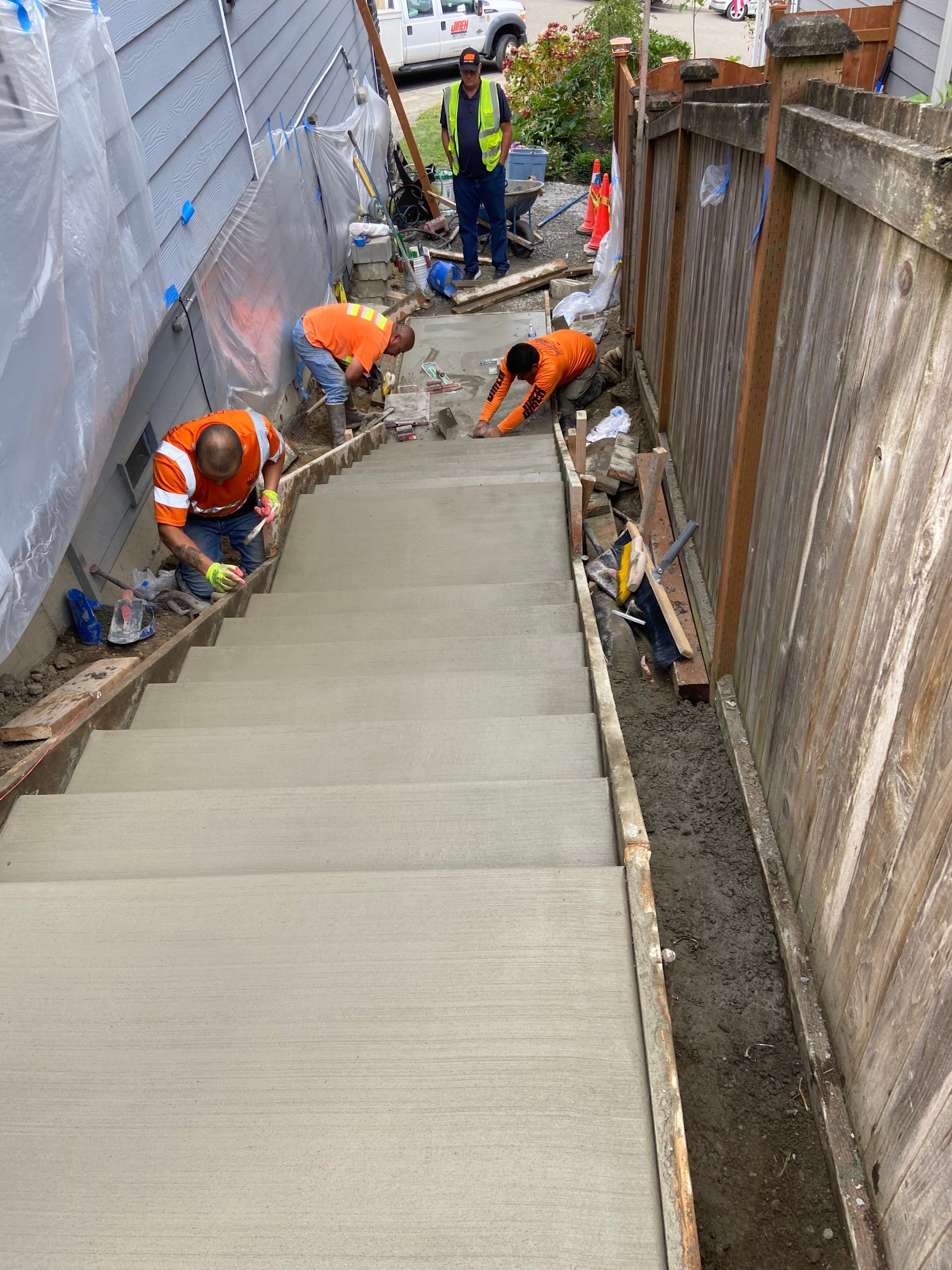 Jireh Outdoor Projects | Concrete Stair Repair and Retaining Wall by Jireh Asphalt & Concrete Inc 