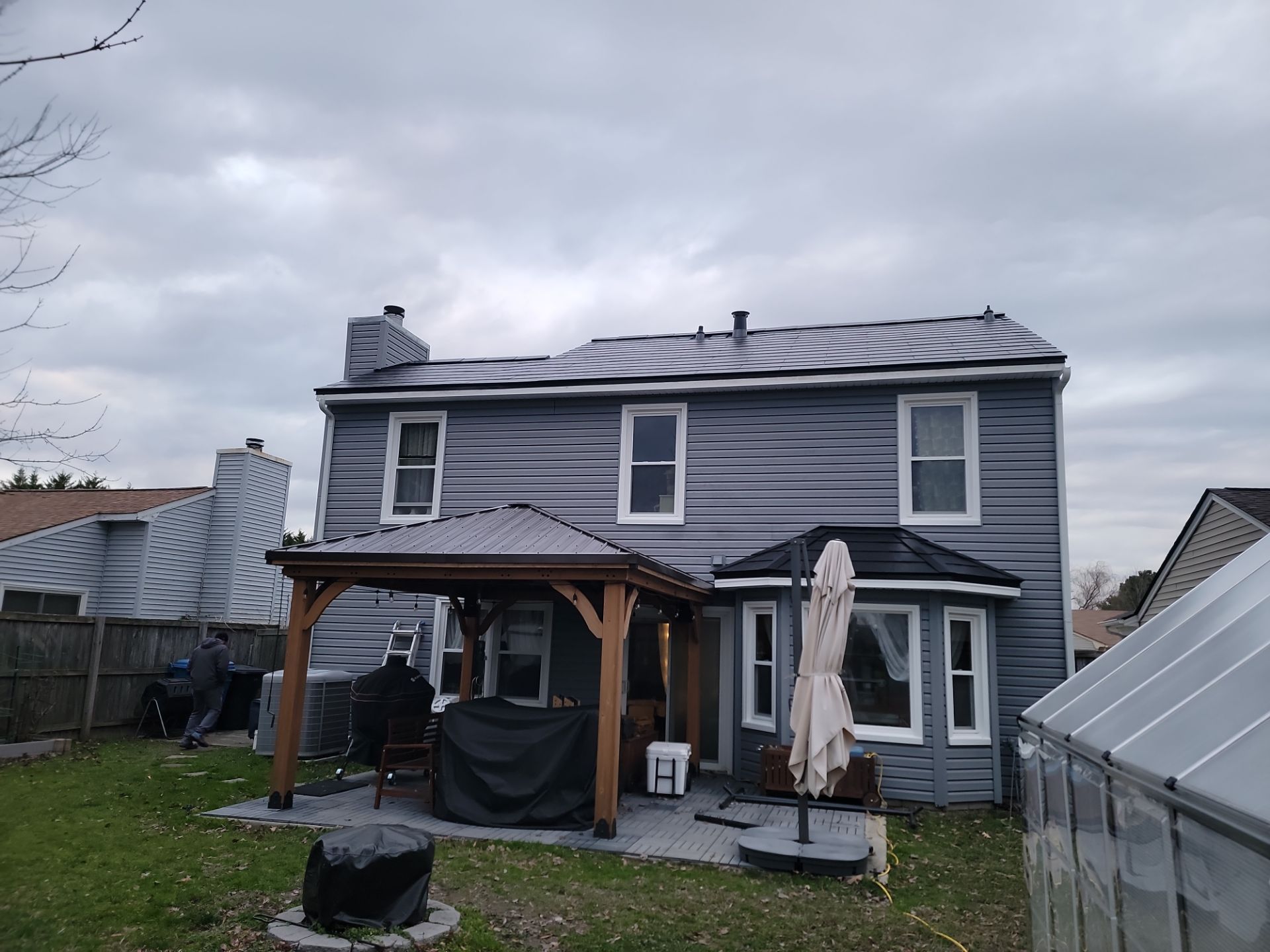Tesla Solar Roof + Powerwall in Virginia Beach, VA by American Home Contractors