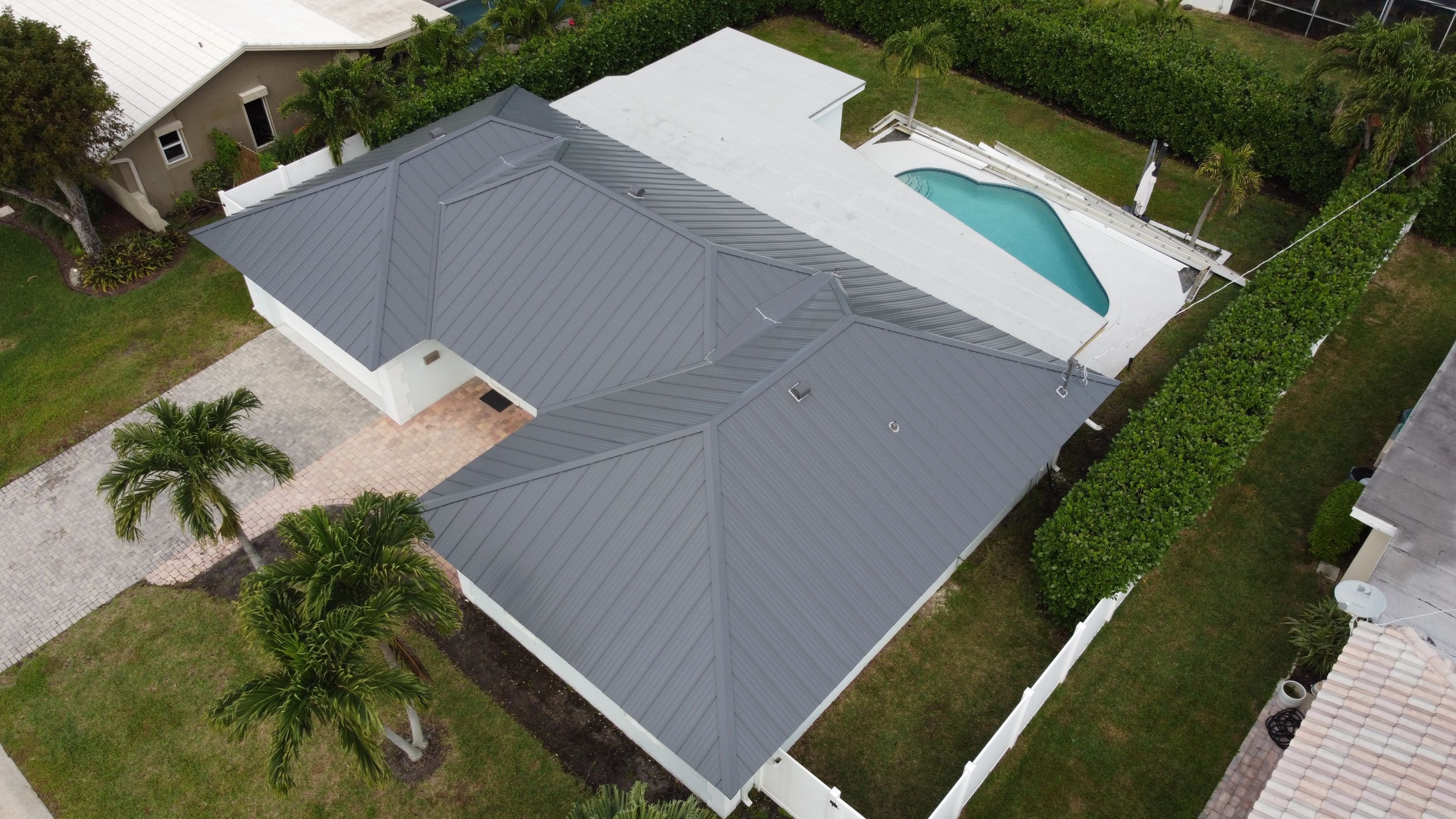 Residential Roofing Installation using 1" Nail strip metal roof by BLUES BROTHERS ROOFING
