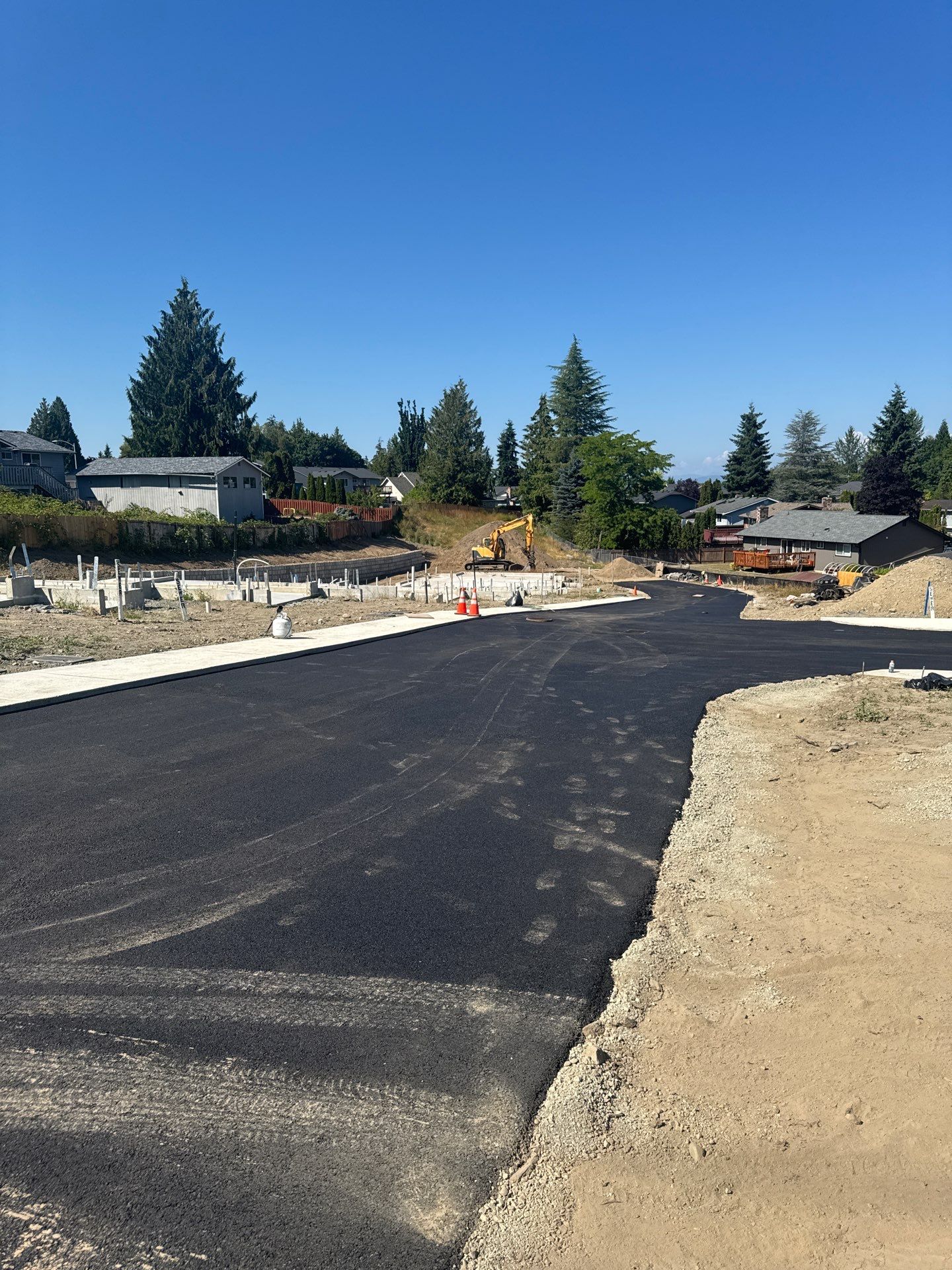 Asphalt Road Repair in Neighborhood  by Jireh Asphalt & Concrete Inc 