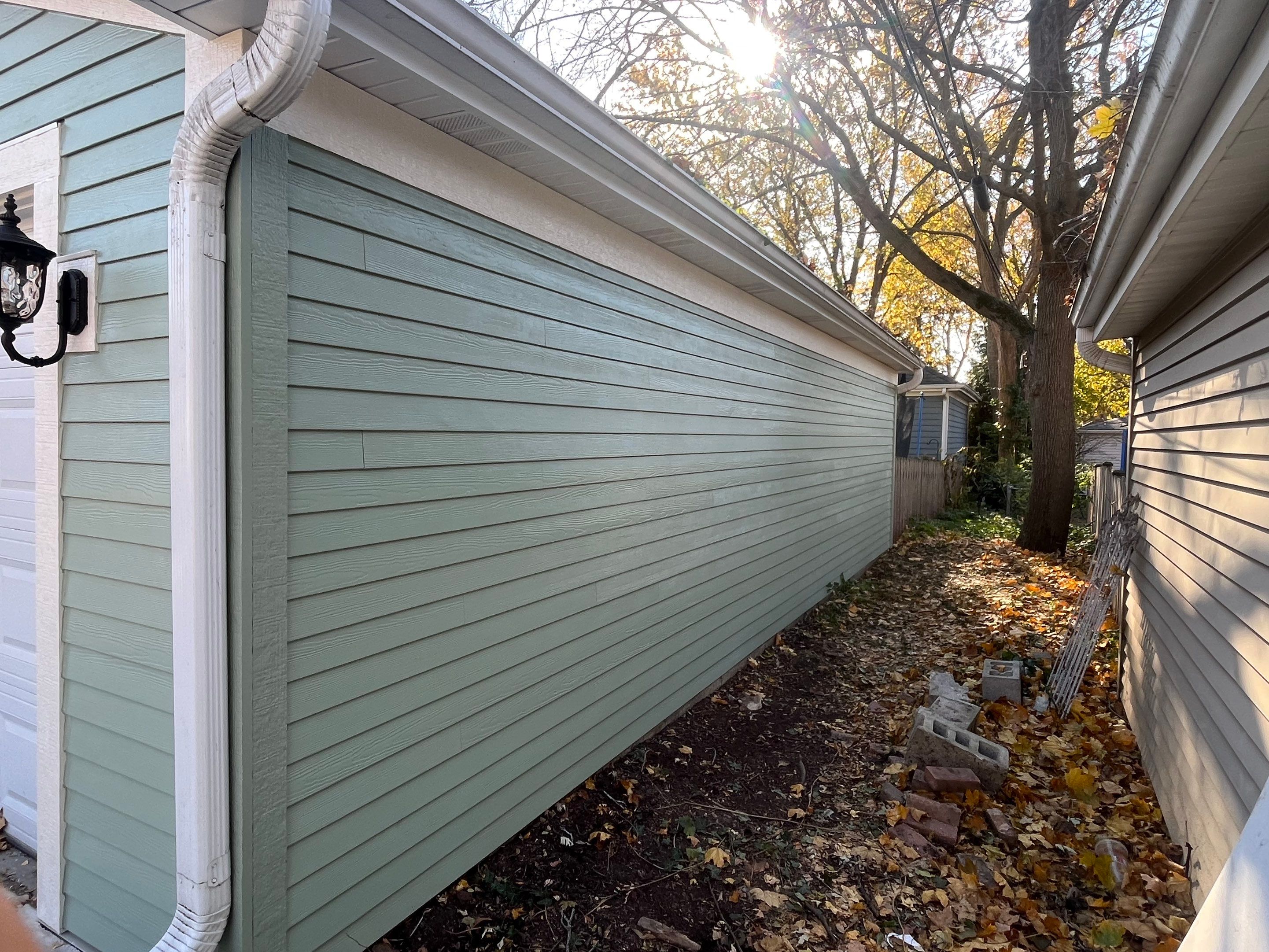 Glen Ellyn Exterior Renovation Featuring James Hardie Siding and Porch Restoration by Great American Exteriors