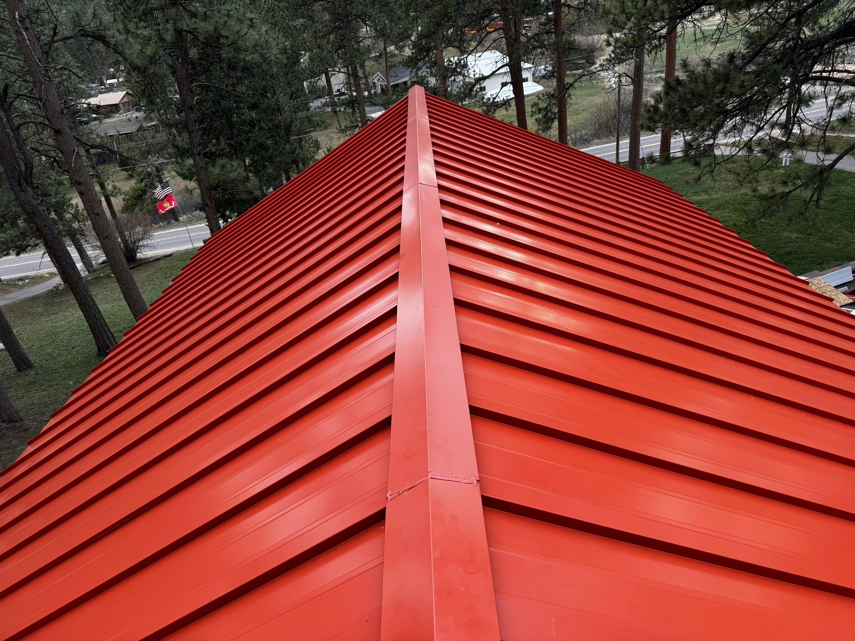 Residential Roofing Installation using Standing Seam Metal by Blue Peaks Roofing LLC 