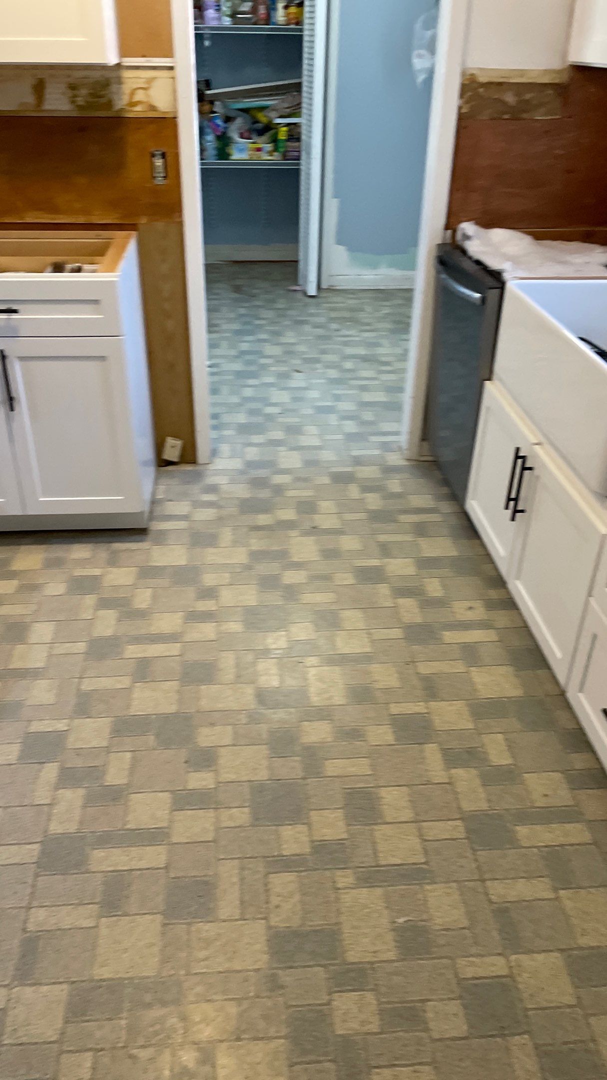 Kitchen Backsplash and Herringbone Tile Floor Remodel by Footprints Floors of Coastal Carolina