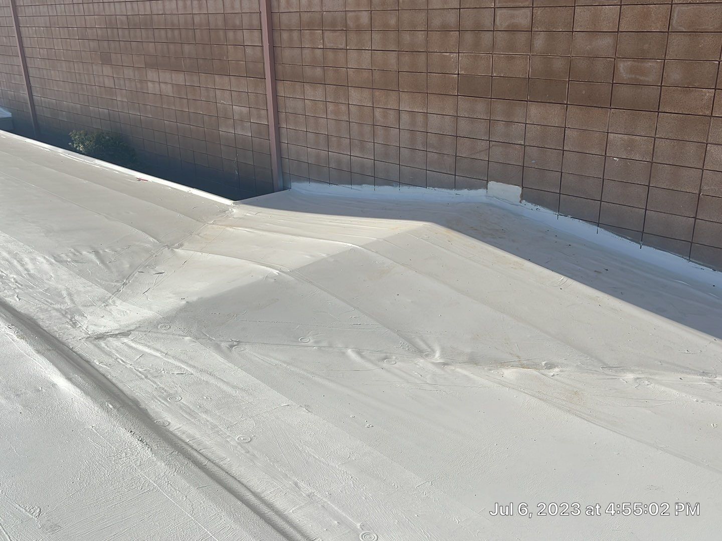 MR Roofing system using Benchmark/PUMA XL coatings over TPO single-ply roofing by Straight Edge Roofing Inc