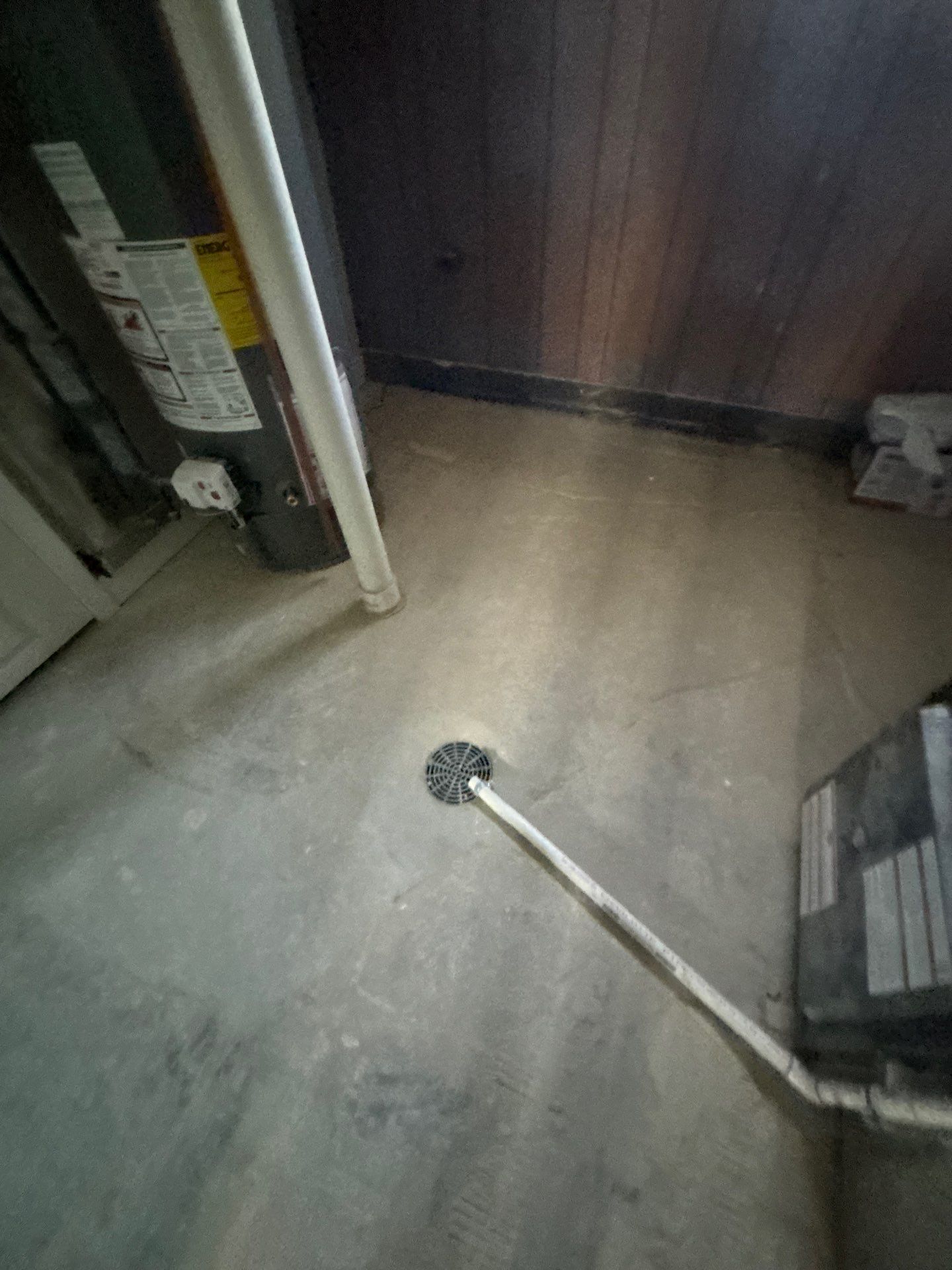 Comprehensive Basement Concrete Floor Coating and Crack Repair in Sioux Falls by Select Painting, Coatings & Garage Cabinets