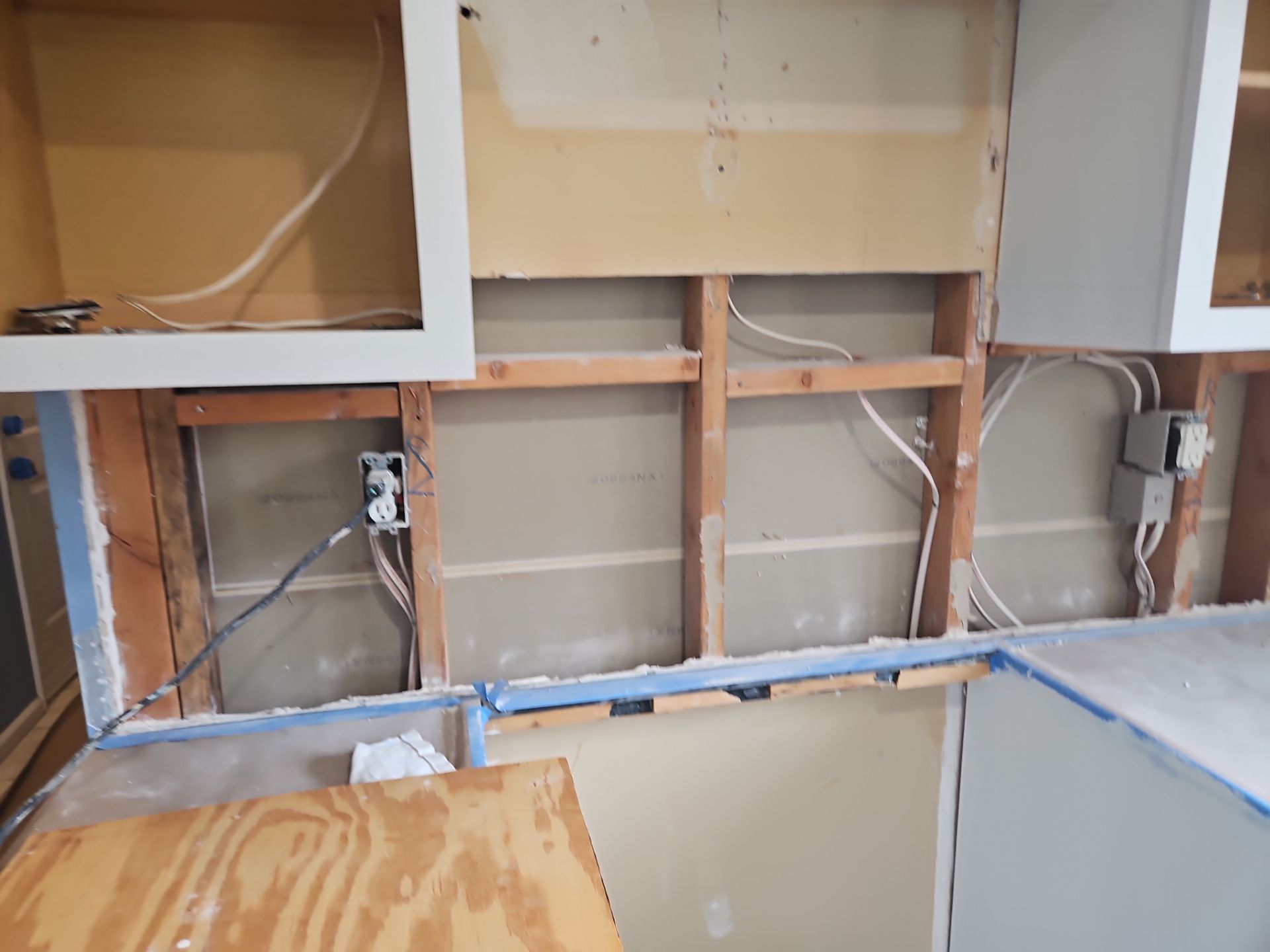 Cabinet Refinishing using Benjamin Moore Command by Spectrum Painting, LLC