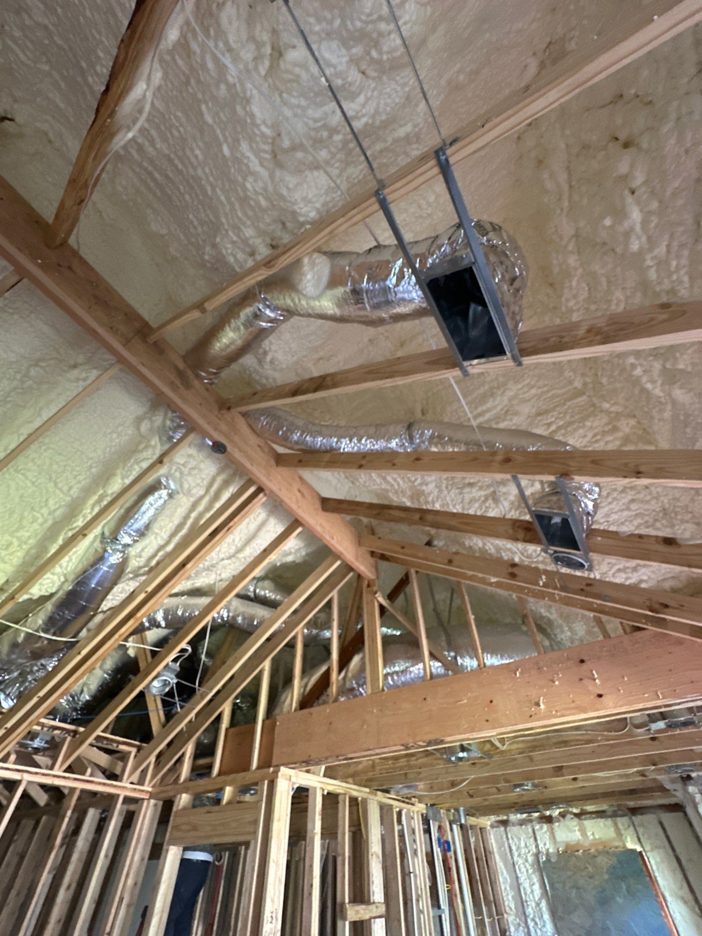 Full encapsulation with open cell spray foam on this custom home in Dallas by Apex Insulation Solutions