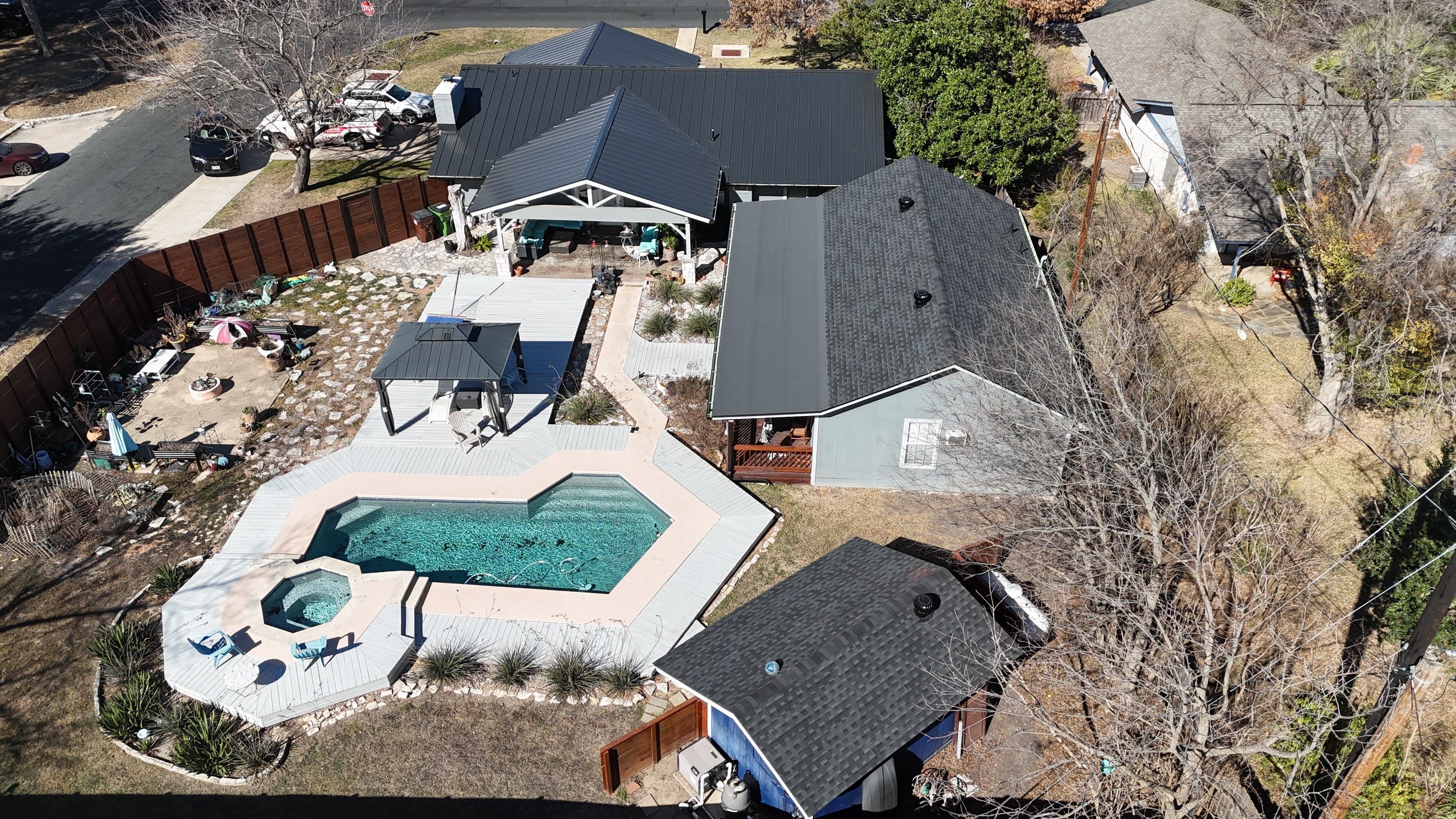 Residential Roof Replacement using Matte Black 24g by Action Exteriors Austin