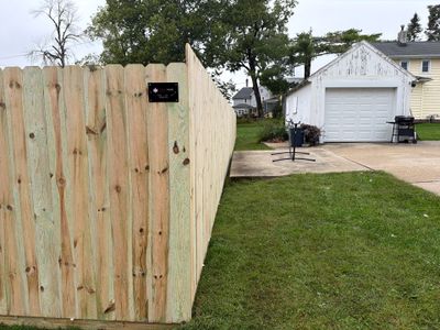 Custom Wood Privacy Fence and Black Chain Link Gate in Independence