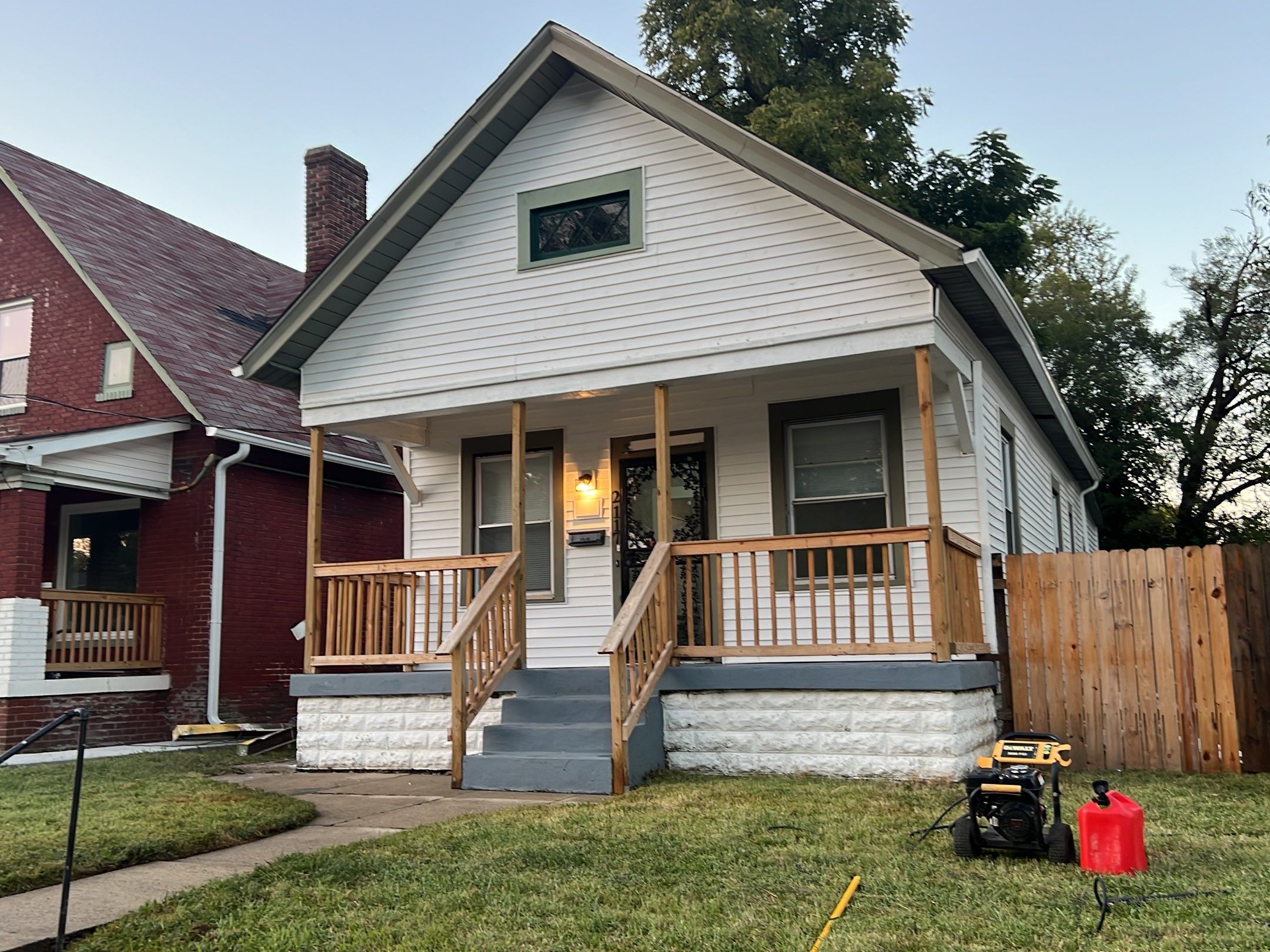 Rental Property Restoration, siding, flooring, gutters, landscaping by Storm Contracting 