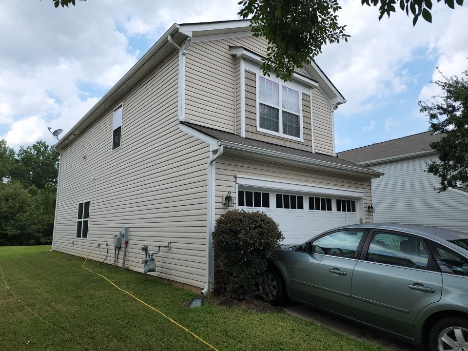 House Wash using cleaner by Power Wash Masters LLC