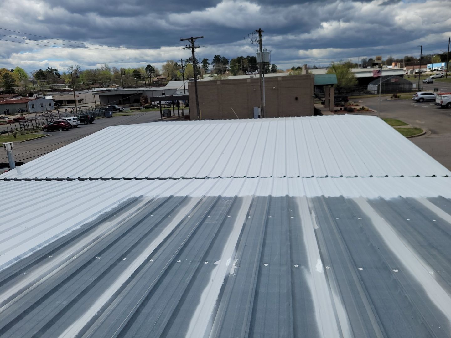 Commercial Metal Restoration System using Aldocoat Coatings by Hostetler Roofing