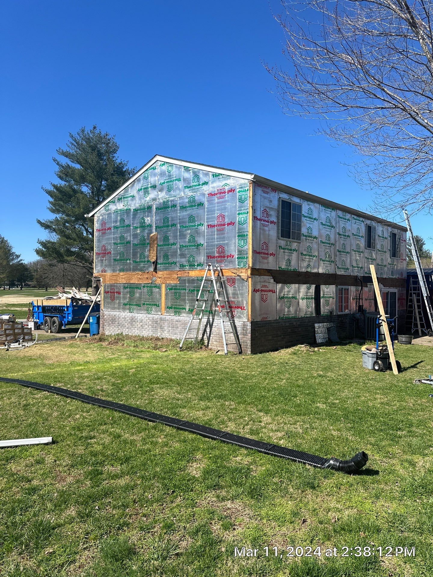Siding Installation using Mastic Plygem Carvedwood by Fahey Roofing + Contracting