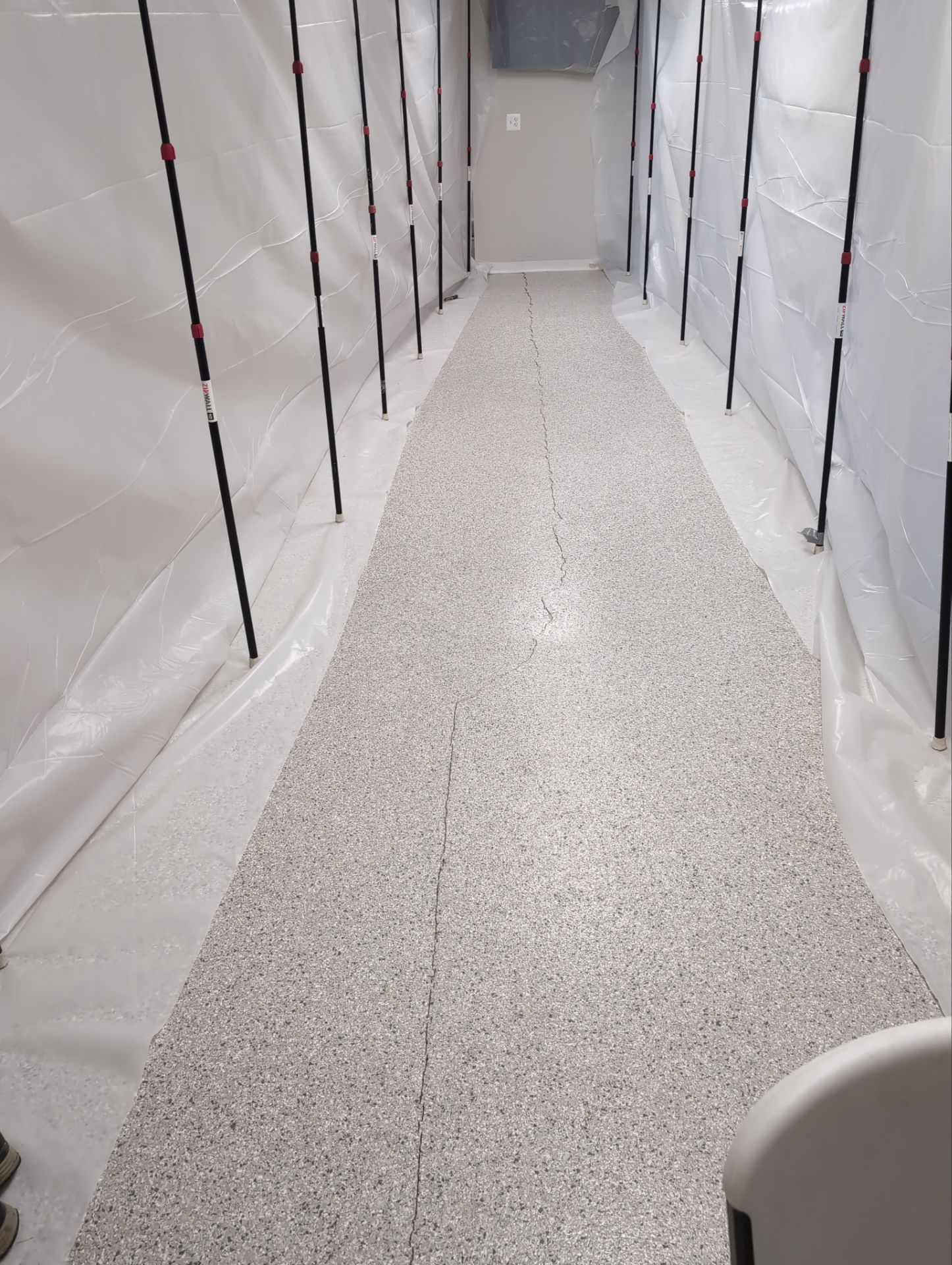 Medina Cracked basement floor with Epoxy by Beck Restoration Management Group