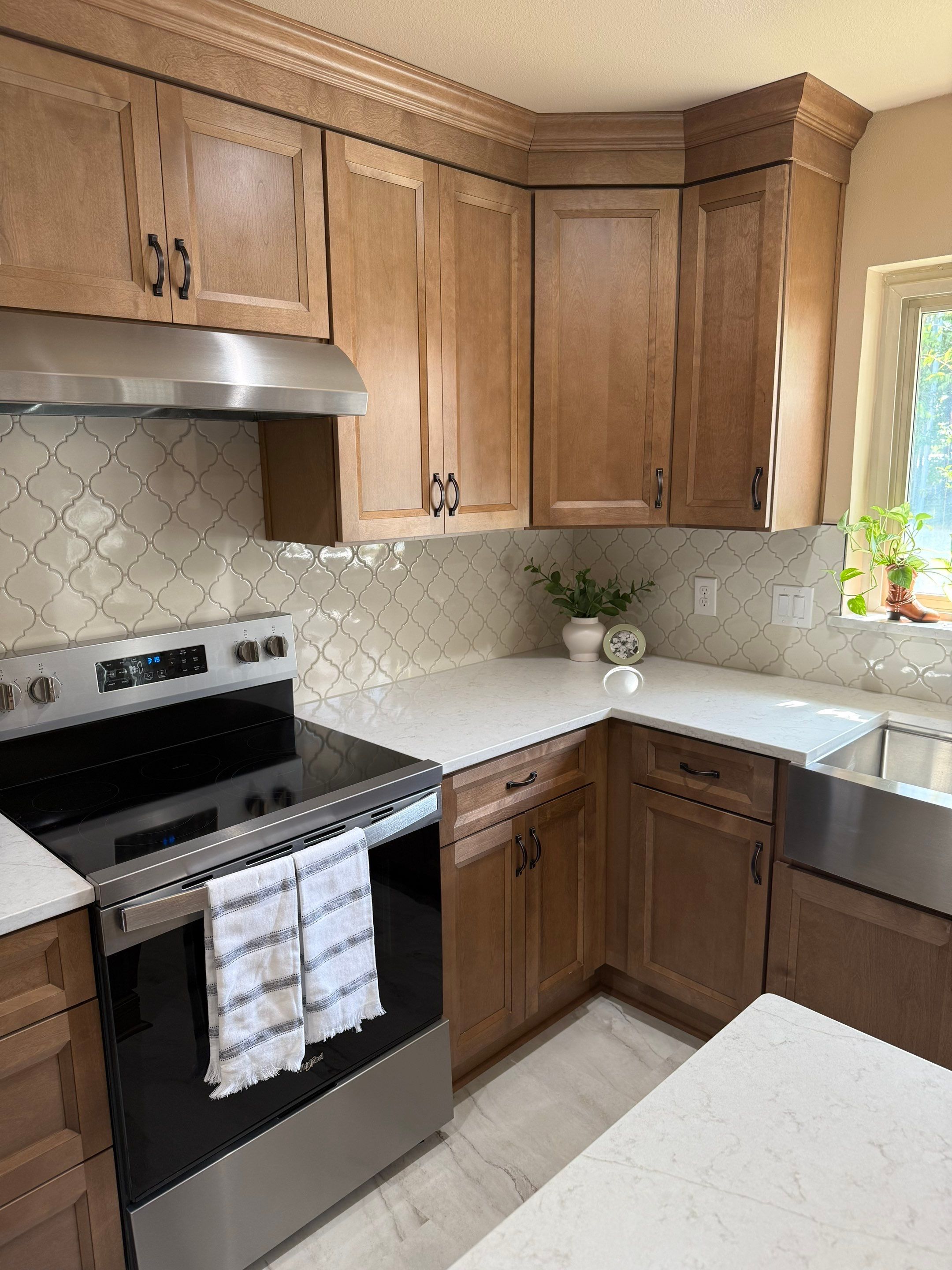 Windcrest Kitchen Remodel Peninsula to Island Before and After by Legacy Bath and Kitchen 