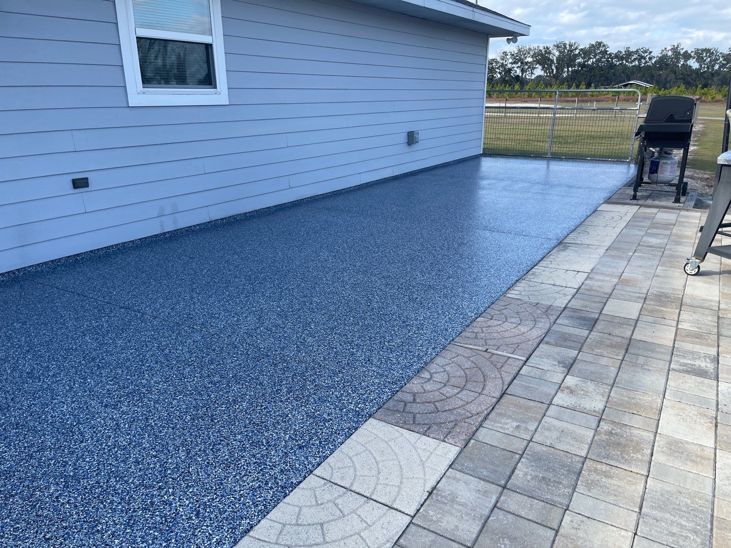 Patio in Trenton, FL in Denim by Cross Creek Concrete Coatings