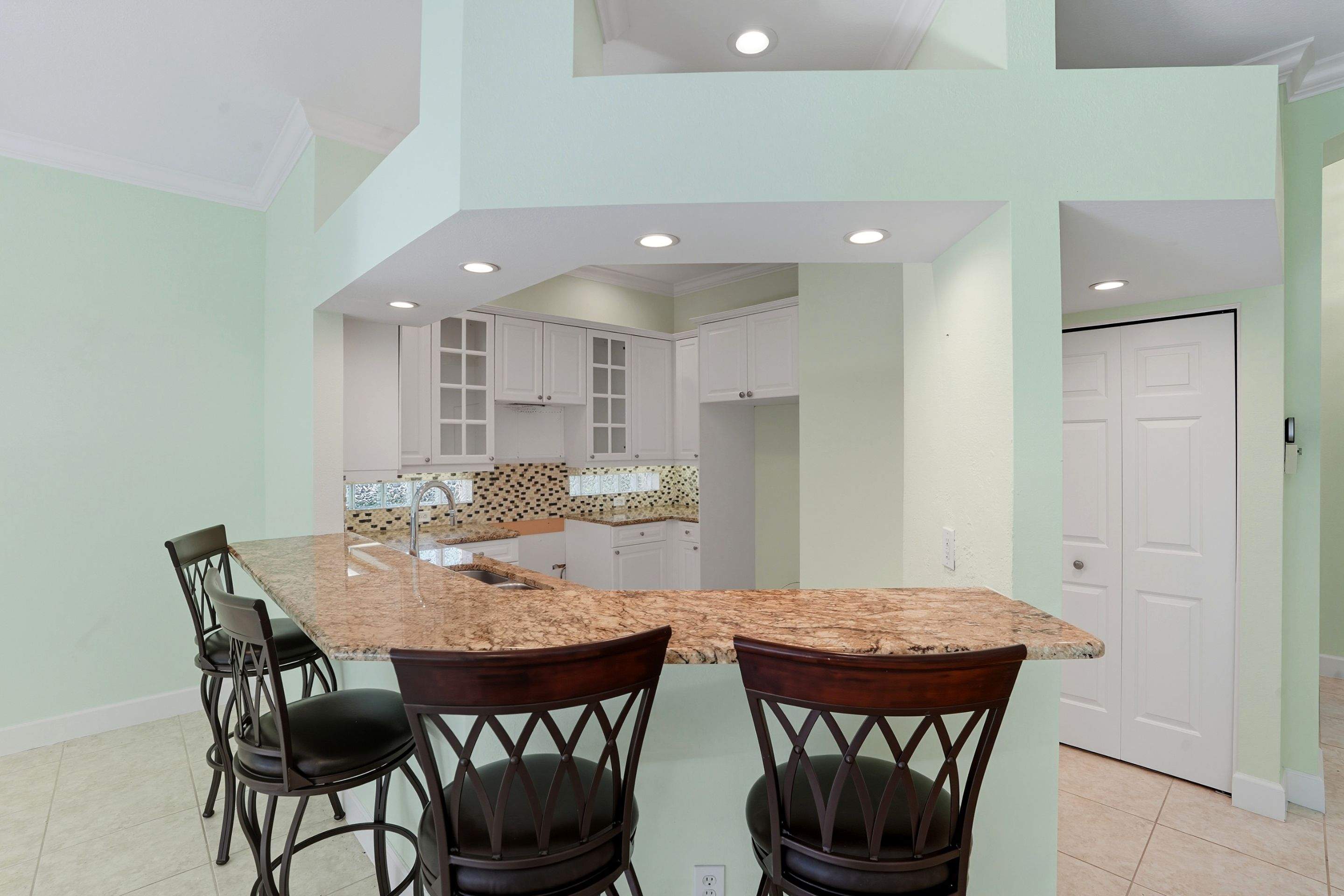 Complete Interior Renovation and Custom Cabinetry in Naples, Florida by A & E Construction of Florida Inc