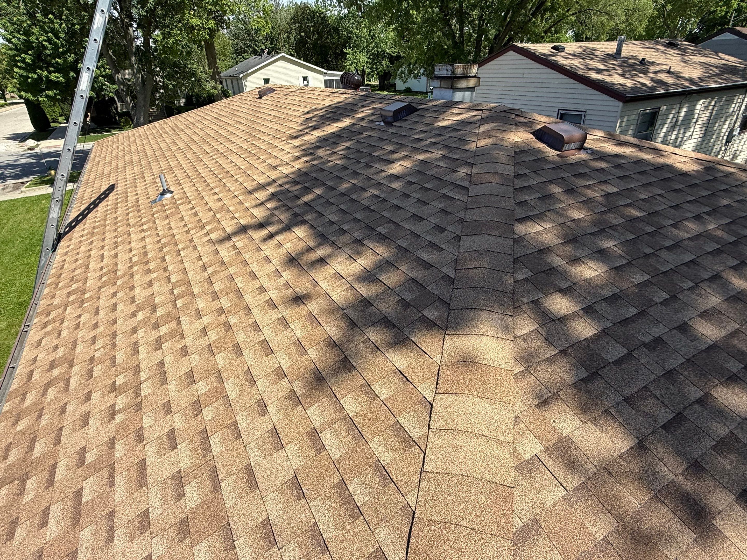 Roof replacement by Optimal Home Improvement 