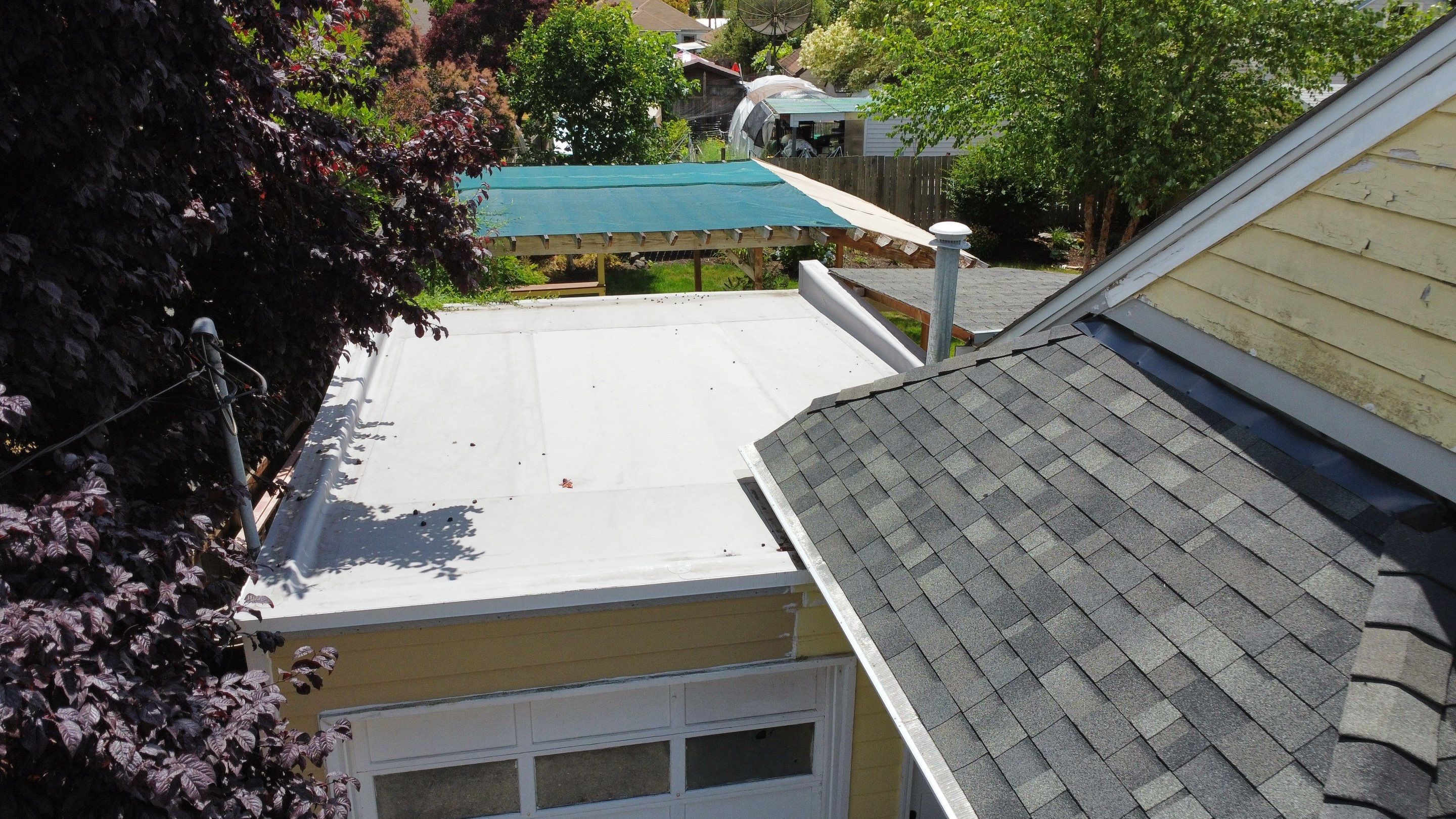 Residential Roof Installation with Added Insulation Barrier  using Malarkey Vista AR Shingles (Color: Storm Grey) by Orezona Building & Roofing Company, Inc.
