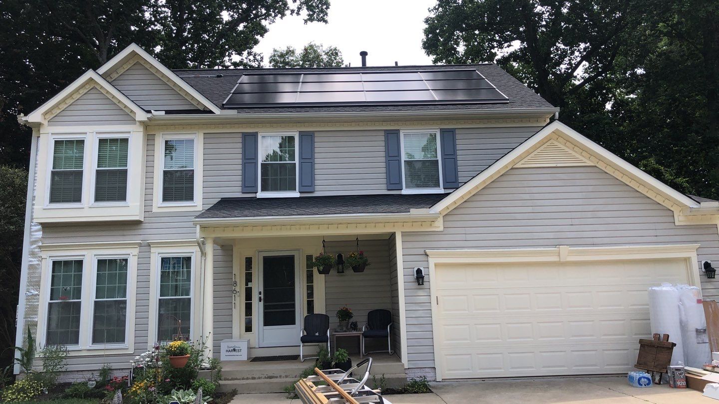 Exterior Home Makeover using GAF Timberline HDZ, GAF Decotech, and James Hardie Siding by American Home Contractors