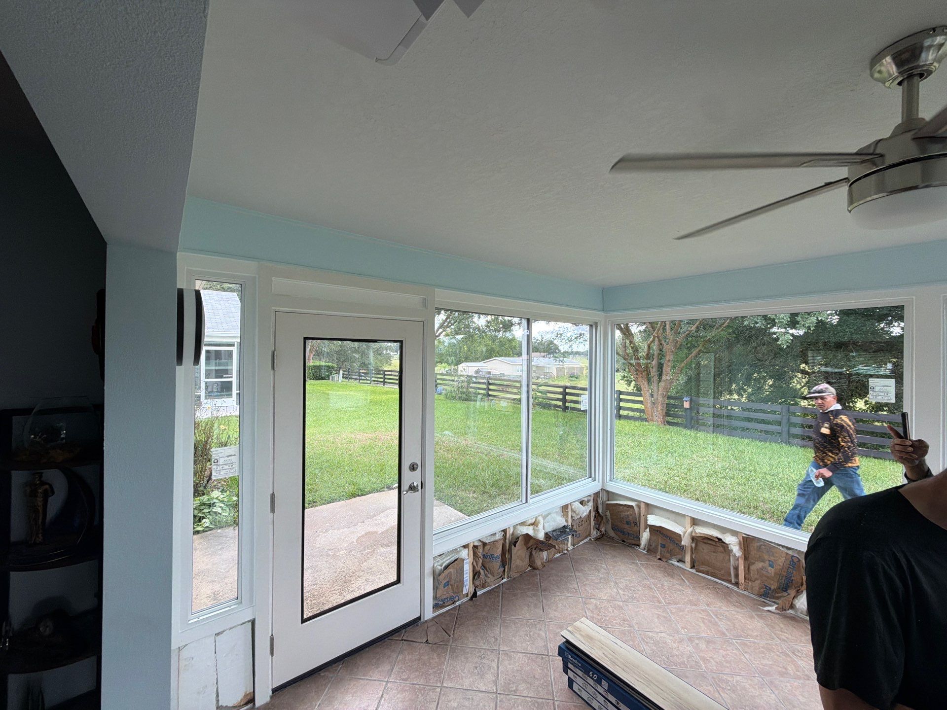 Sunroom Conversion with Alside Windows and Provia Door in The Villages by Windows & Doors Store