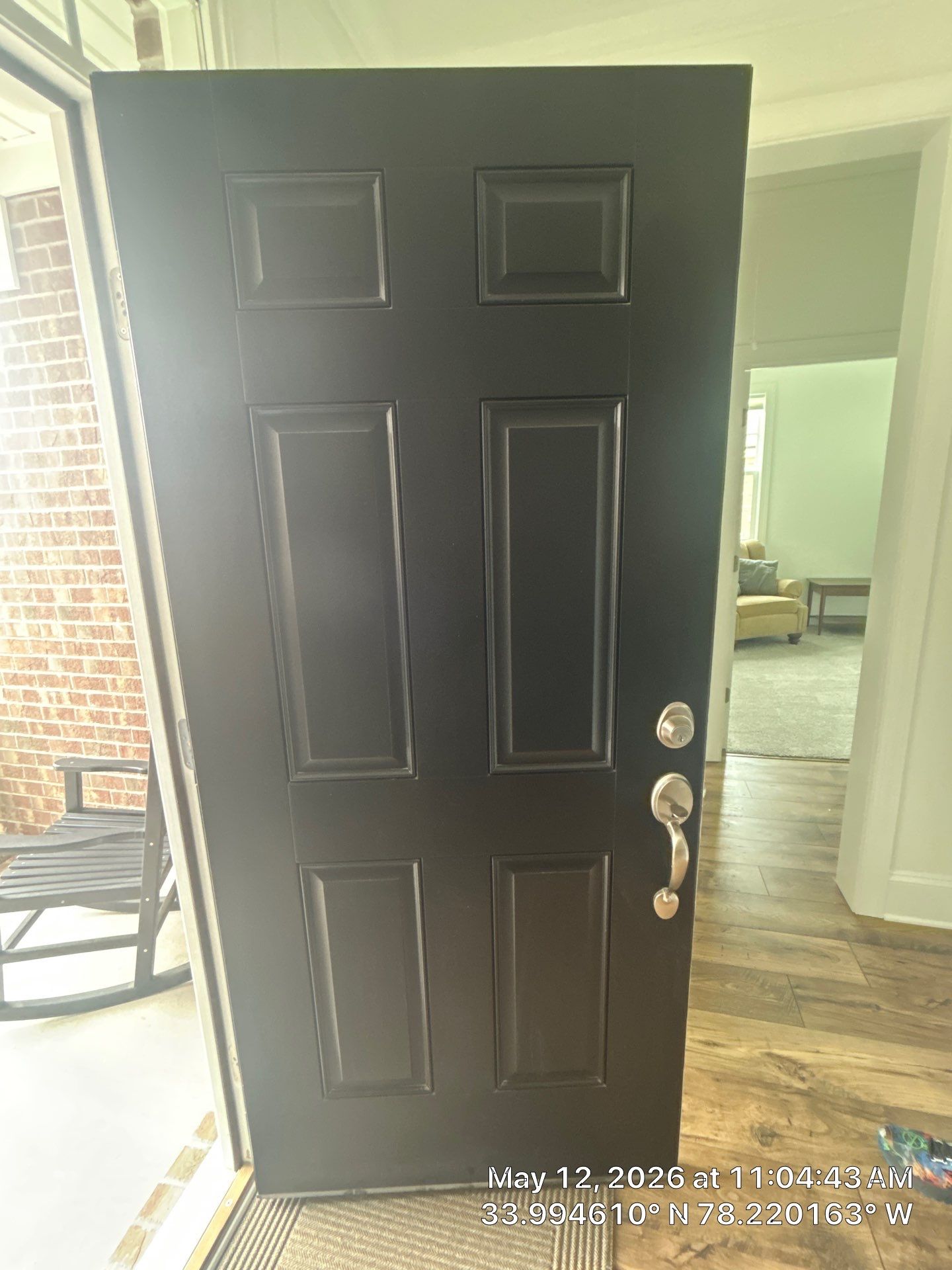 Bolivia Entry Door Upgrade and Modern Pendant Light Installation by RGR Construction and Roofing, LLC