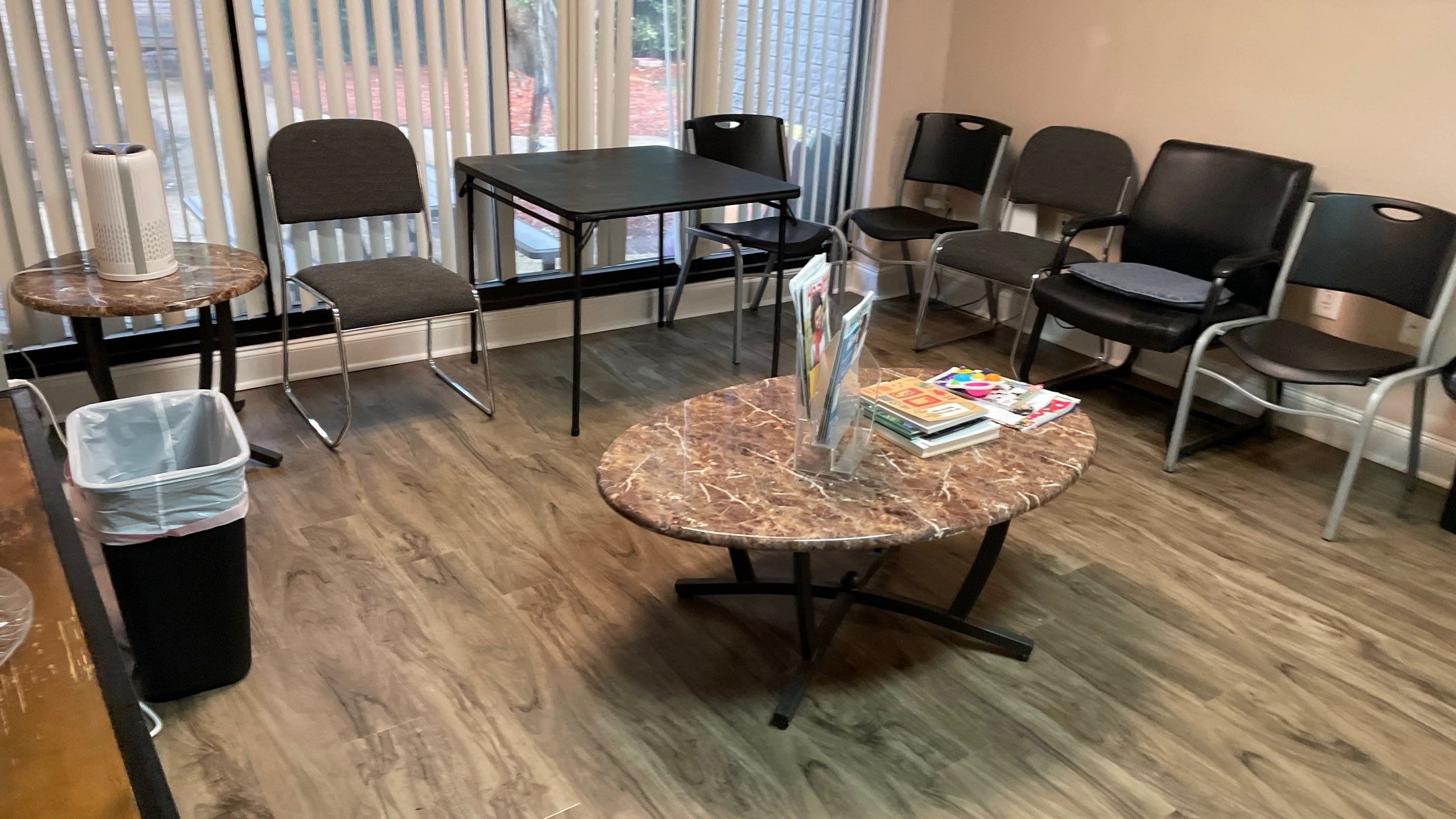 Office Remodel from Worn Out Carpet to Sleek Glued Down LVP by Footprints Floors of Coastal Carolina