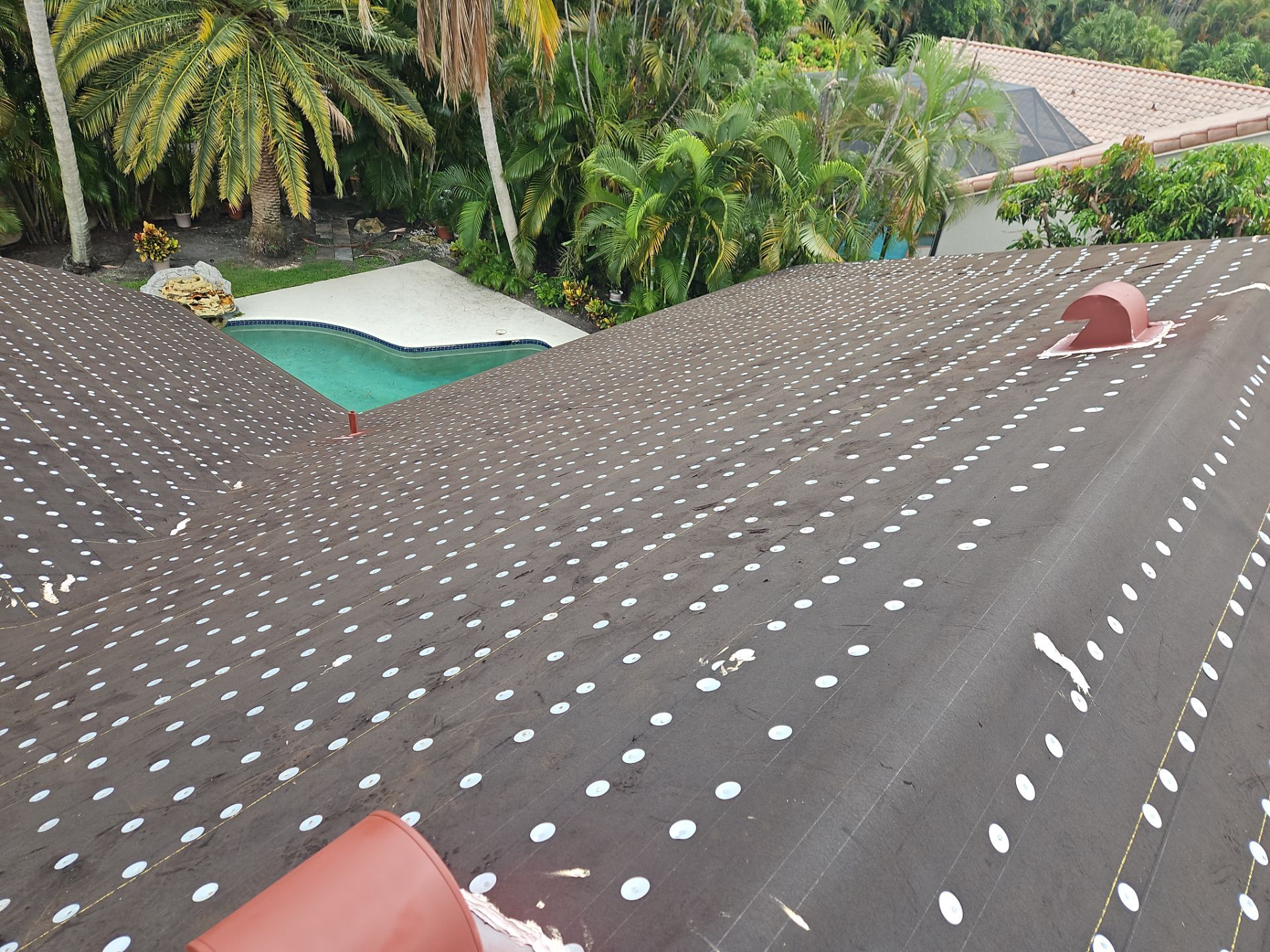 Residential Roofing Installation using 1" Nail strip metal roof by BLUES BROTHERS ROOFING