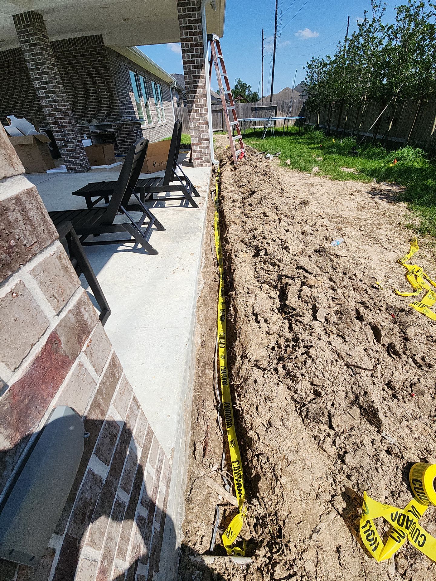 Covered patio and Summer Kitchen in Spring, TX by SophAlx LLC