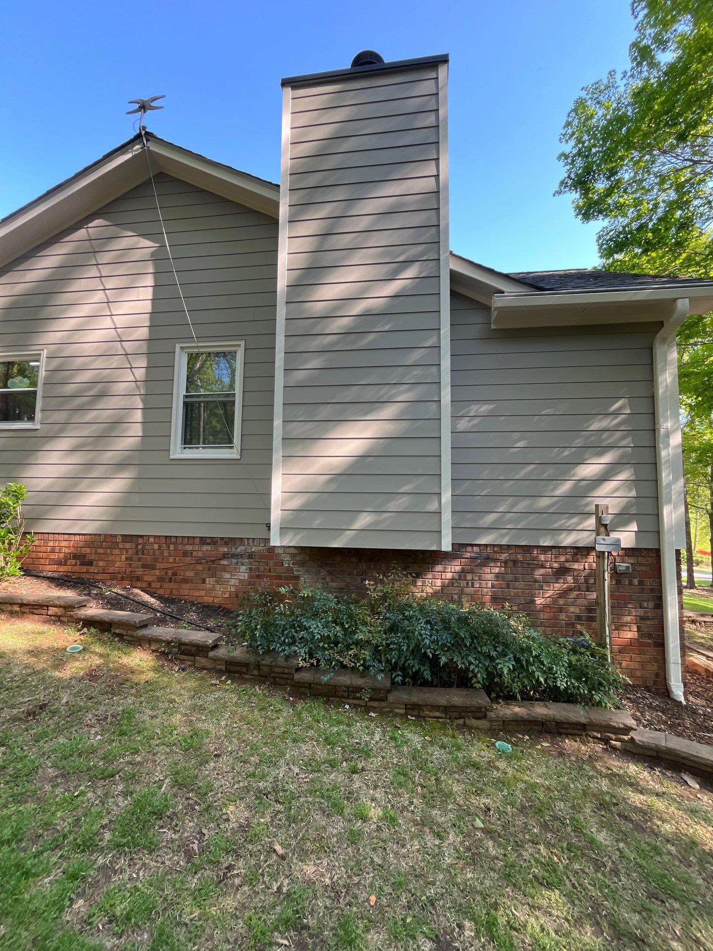 Window, Siding, & Rotten Wood Replacement with Exterior Painting in Woodstock, GA by Nelson Exteriors 