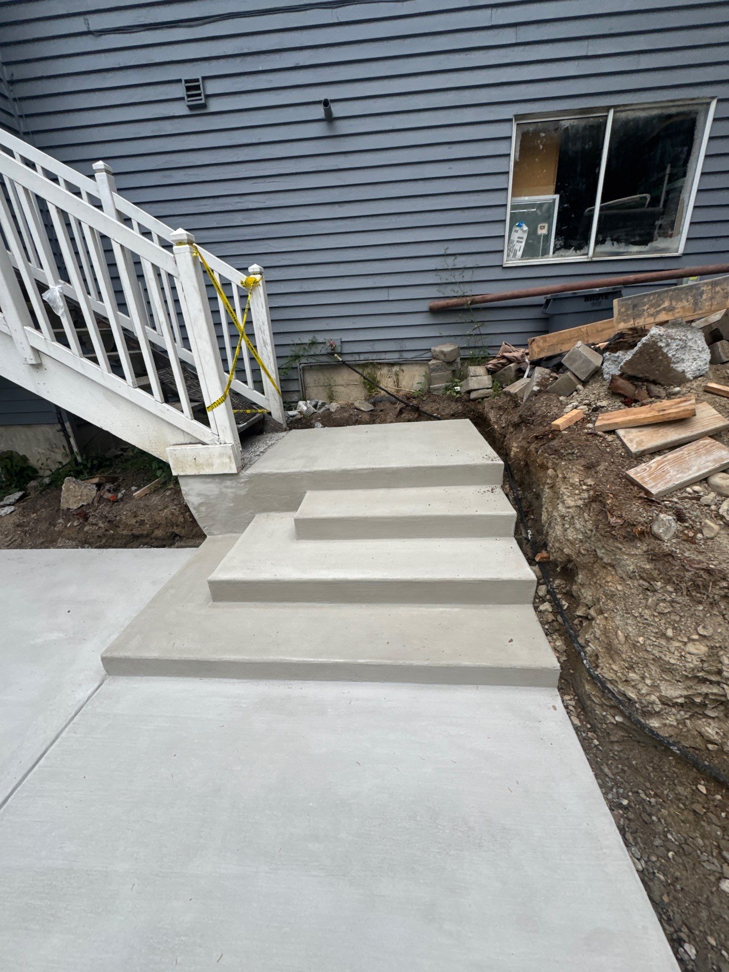 Concrete Back Patio Makeover  by Jireh Asphalt & Concrete Inc 