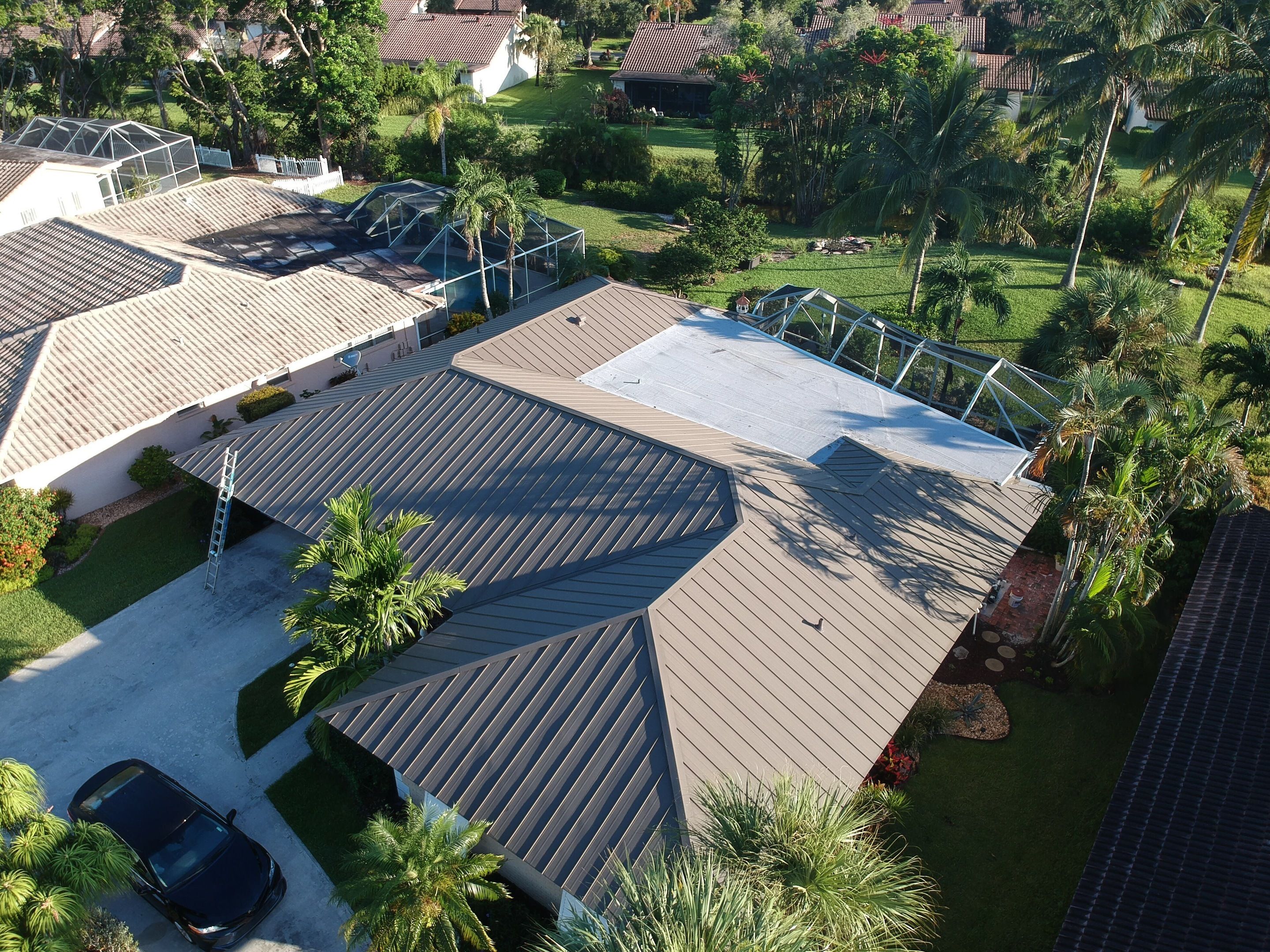 Residential Roofing Installation using 1" Nail strip metal roof by BLUES BROTHERS CONSTRUCTION CORP