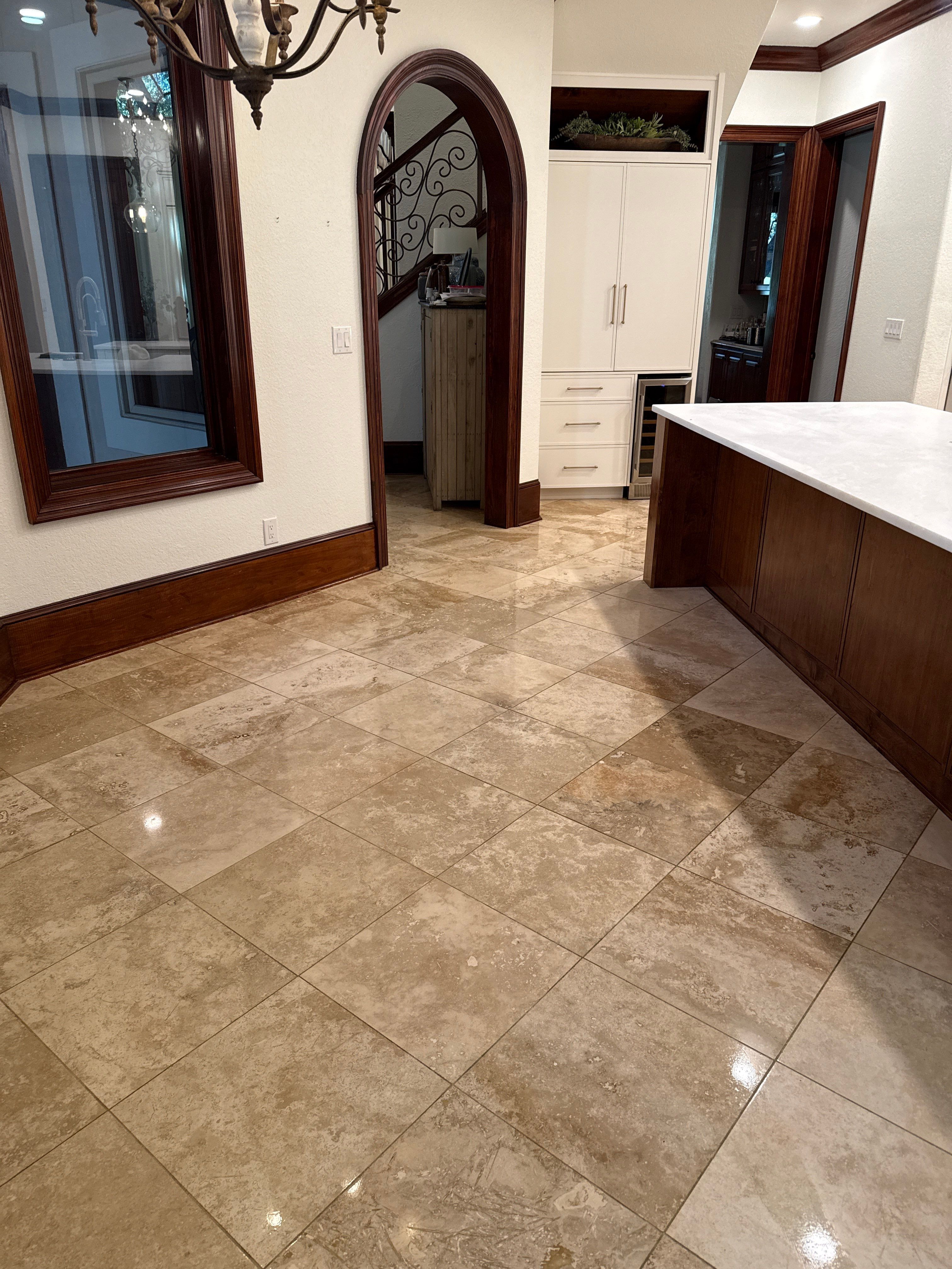 Polished Travertine Floor Restoration for Gulf Shores Residence by Cornerstone Hard Surface Restoration