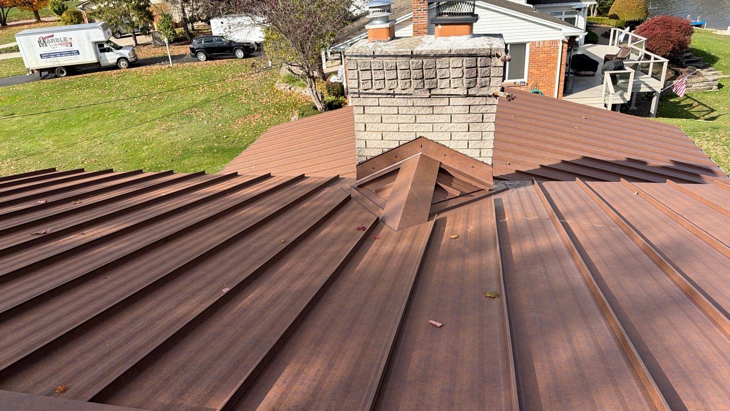Roof Replacement using MS Standing Seam Roof Western Rust by 180 Contractors