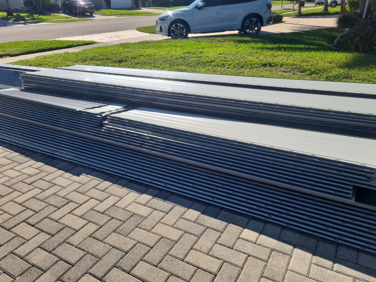 Residential Roofing Installation using 1" Nail strip metal roof by BLUES BROTHERS ROOFING