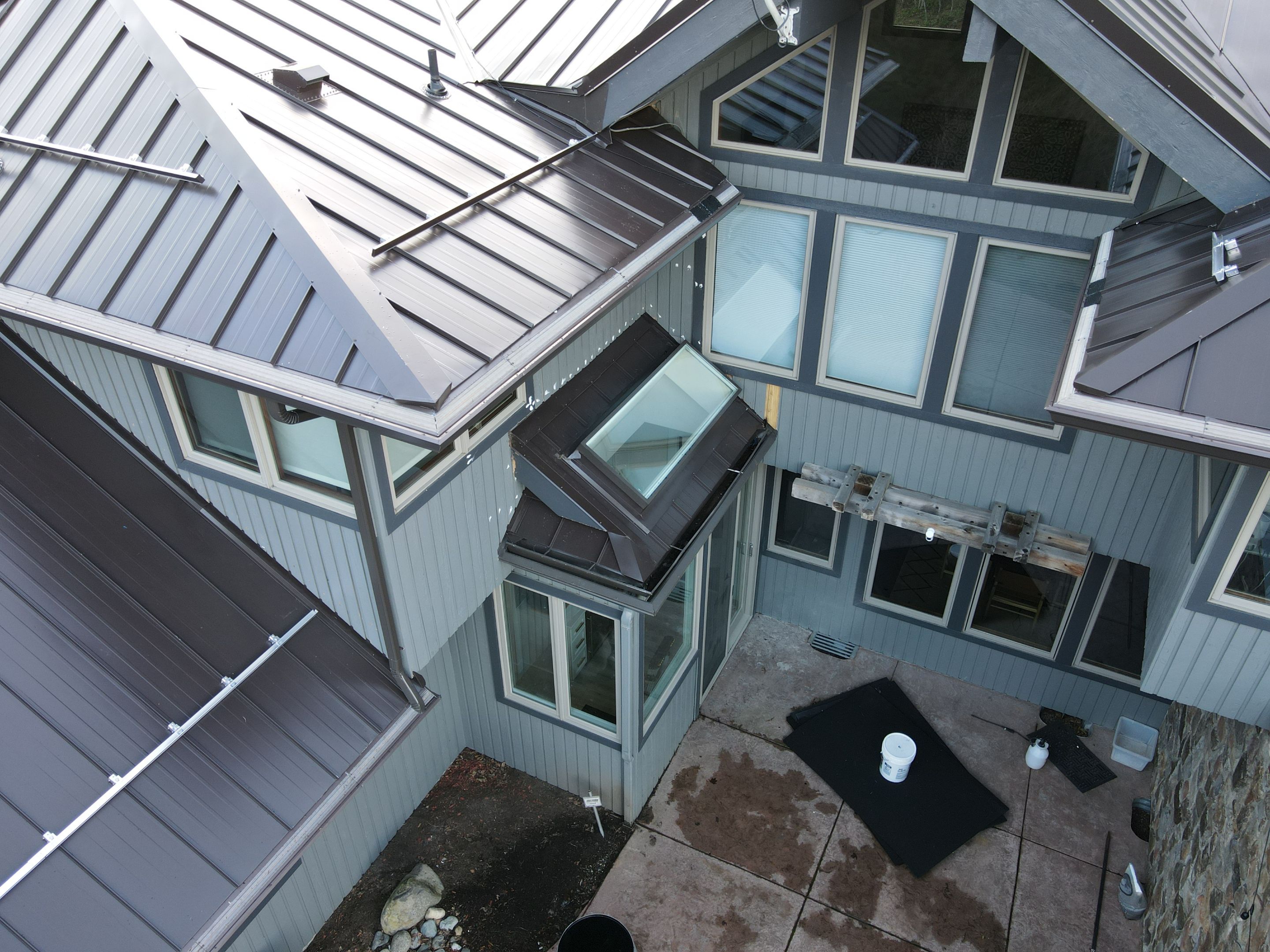 North Bend Roof Replacement using Standing Seam Metal - Dark Bronze by RoofSmart