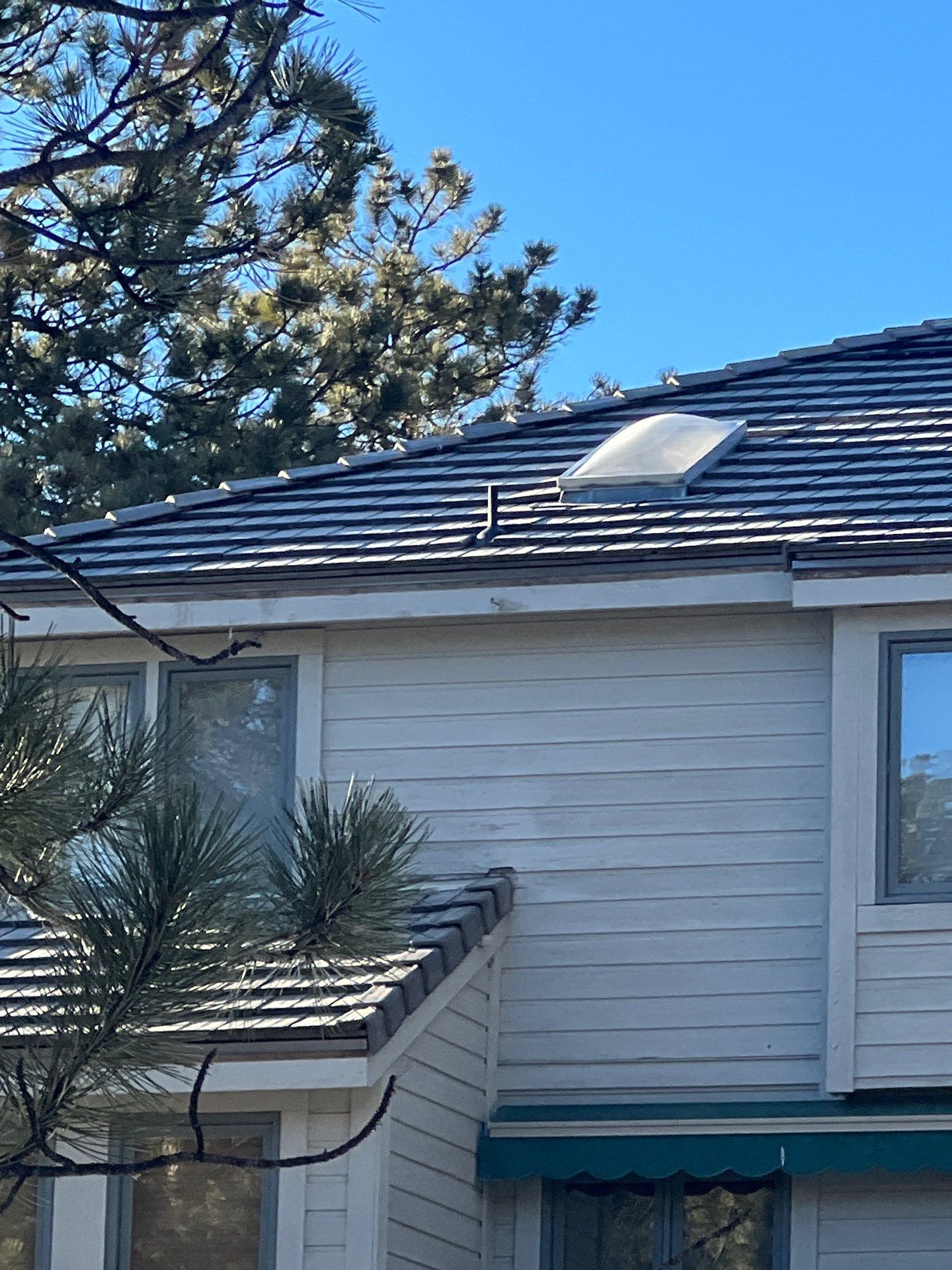 Residential Roofing Installation using Concrete Tile by Blue Peaks Roofing LLC 