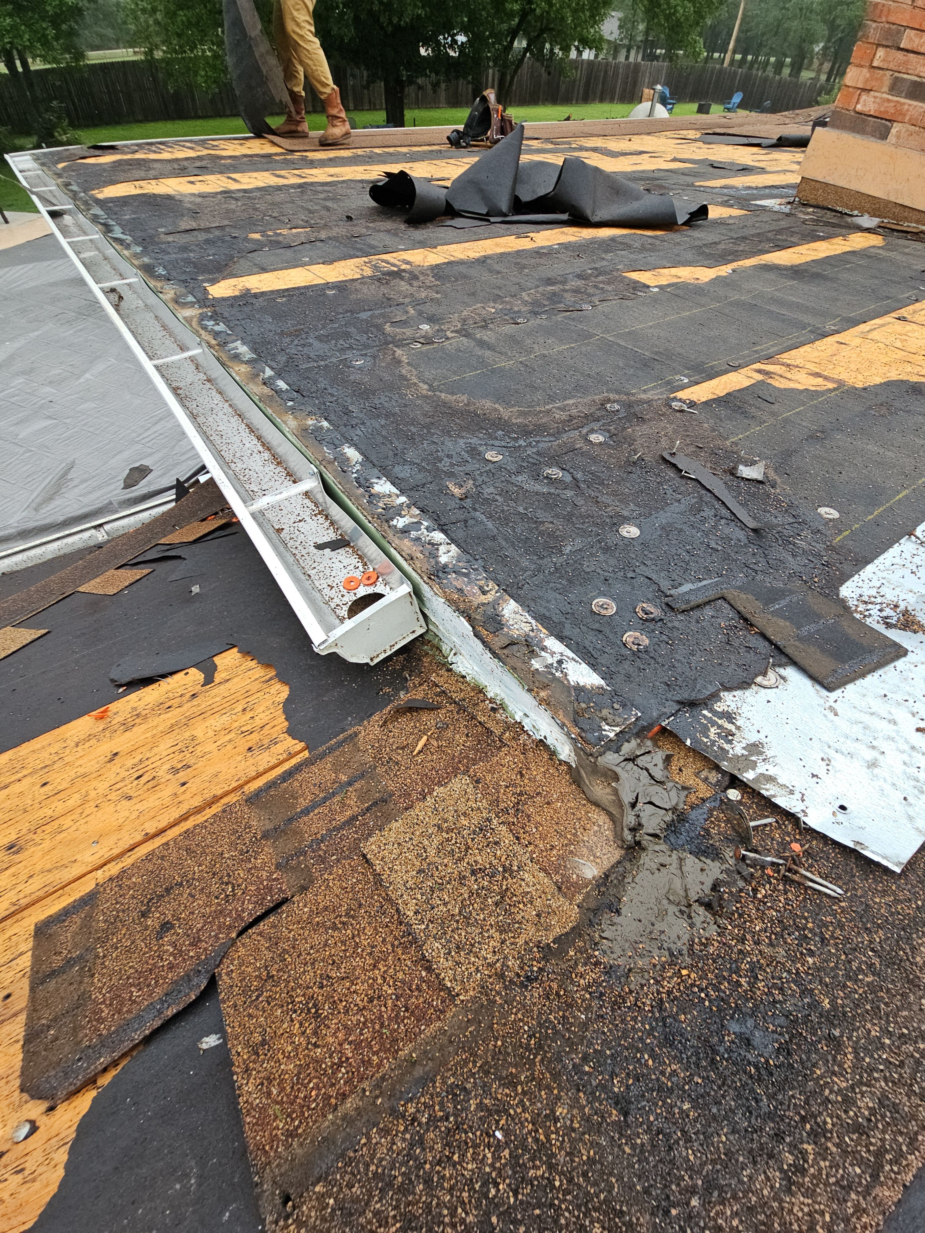 "Full Roof Replacement Due to Hail and Water Damage – Before & After" by road roofing llc