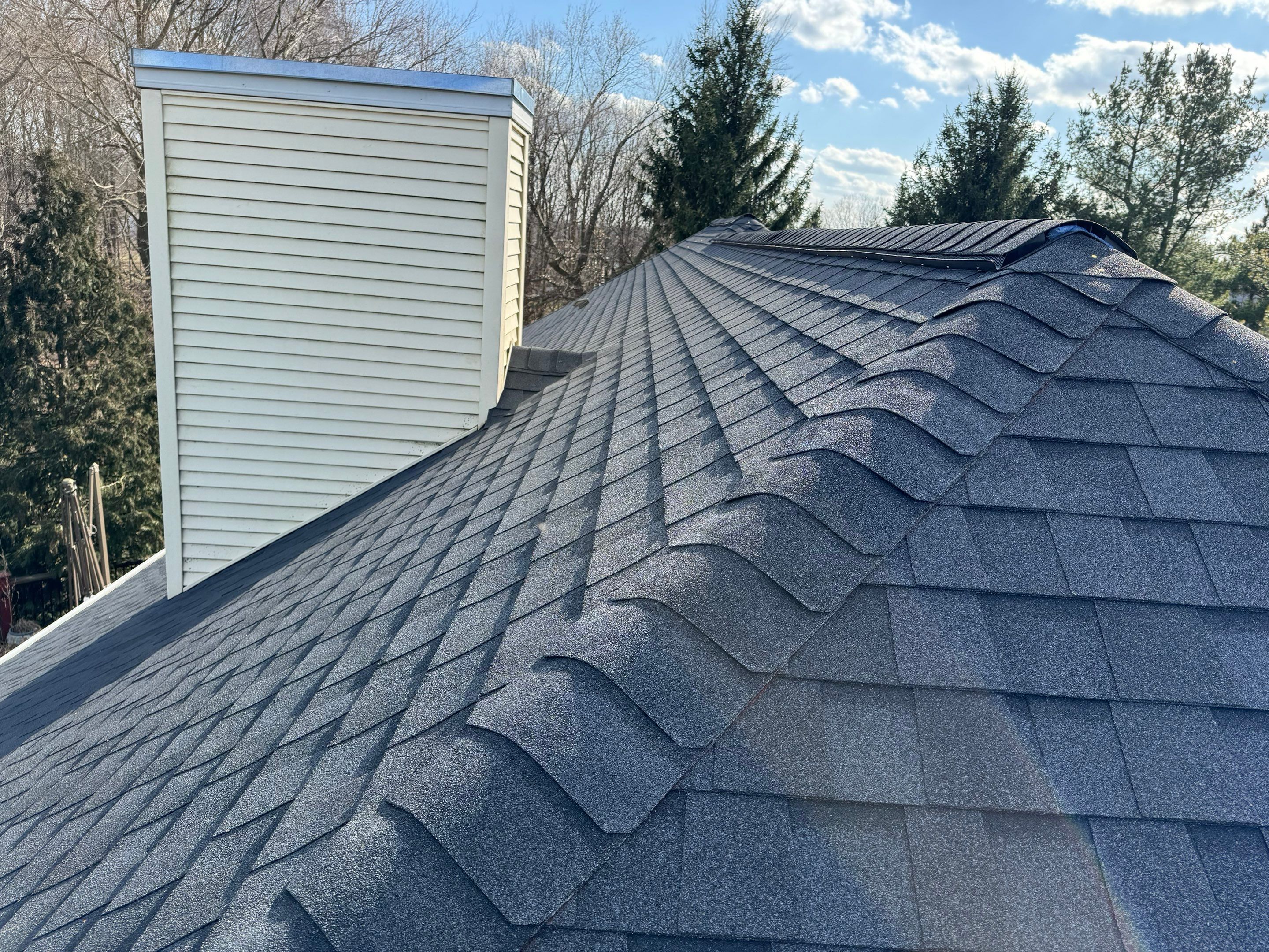 Residential Roofing Installation using Certainteed Landmark ClimateFlex by GRACCO