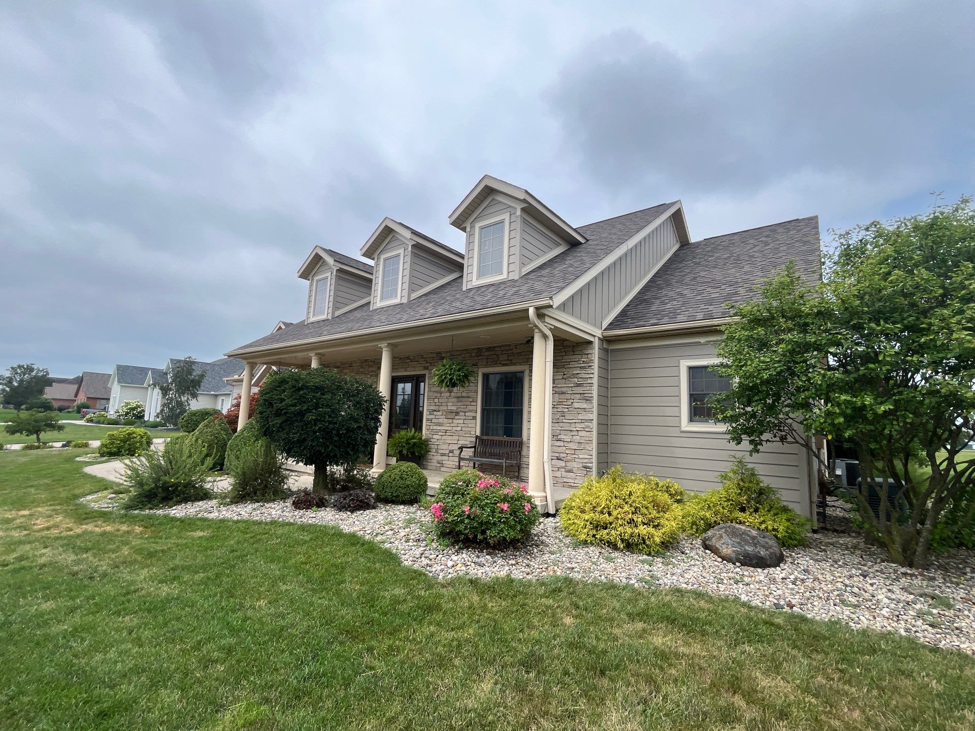 Siding Installation using Alside Ascend Board and Batten Pebblestone Clay by Nitro Roofing and Construction