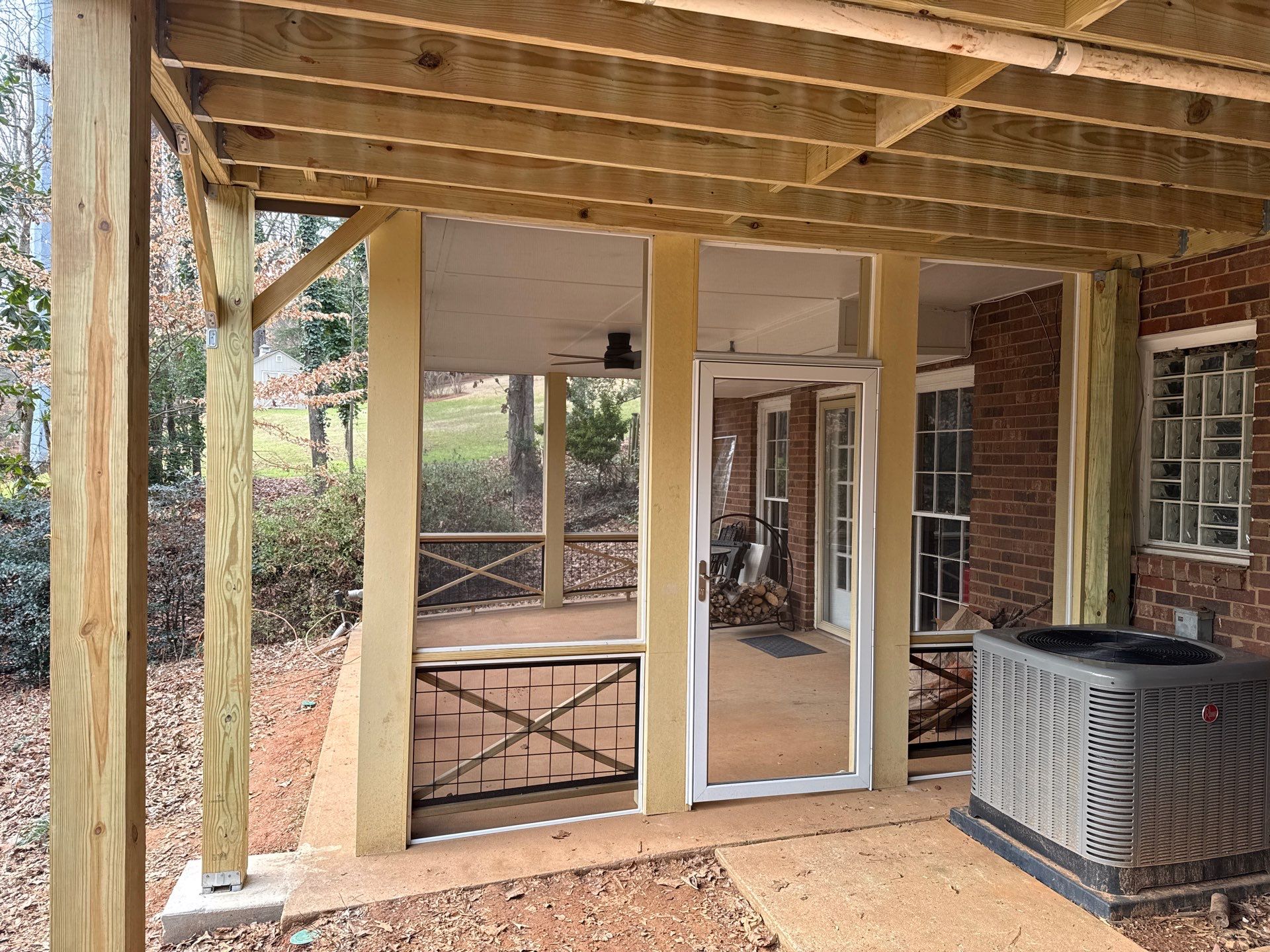 Deck Build and Screened-In Porch Install with Wild Hog 6' Black Mesh Panel Railing by Nelson Exteriors 