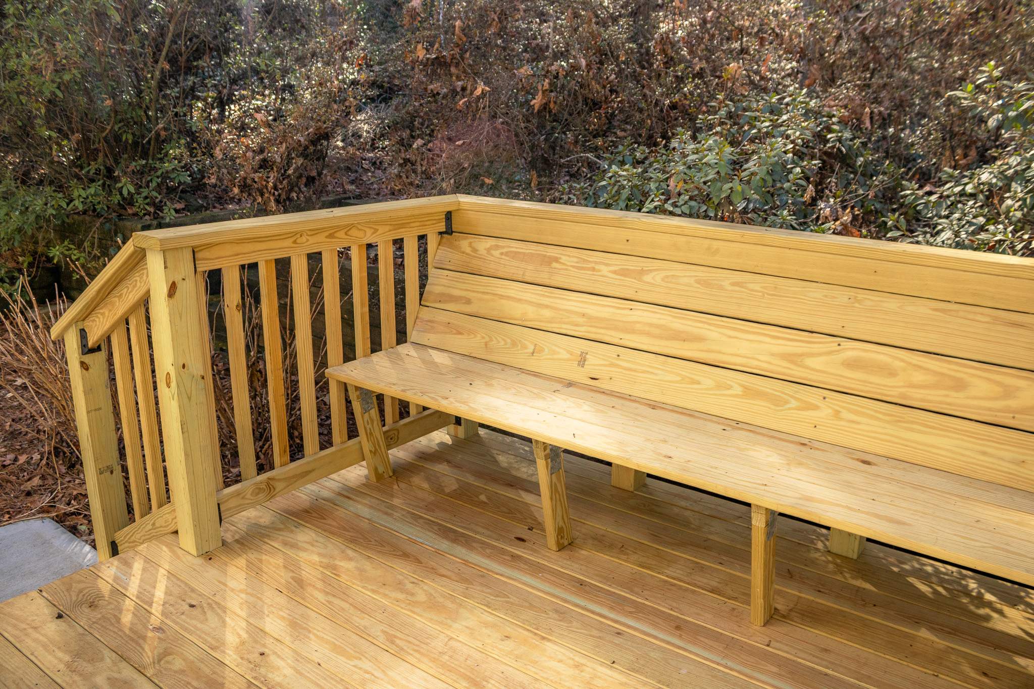 Deck Resurface with Wood Bench Install Using Pressure Treated Pine by Nelson Exteriors 