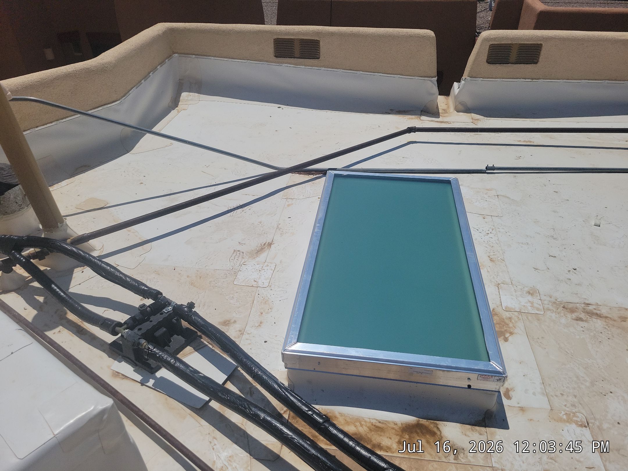 Low-e Glass Skylight Installation in Rio Rancho by Doyle Roof Masters Inc