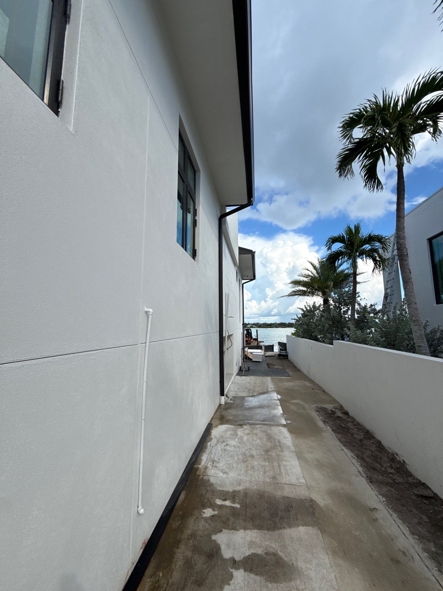 Seamless Aluminum Gutter Installation using black seamless gutters in Sarasota FL by Gutter Professors