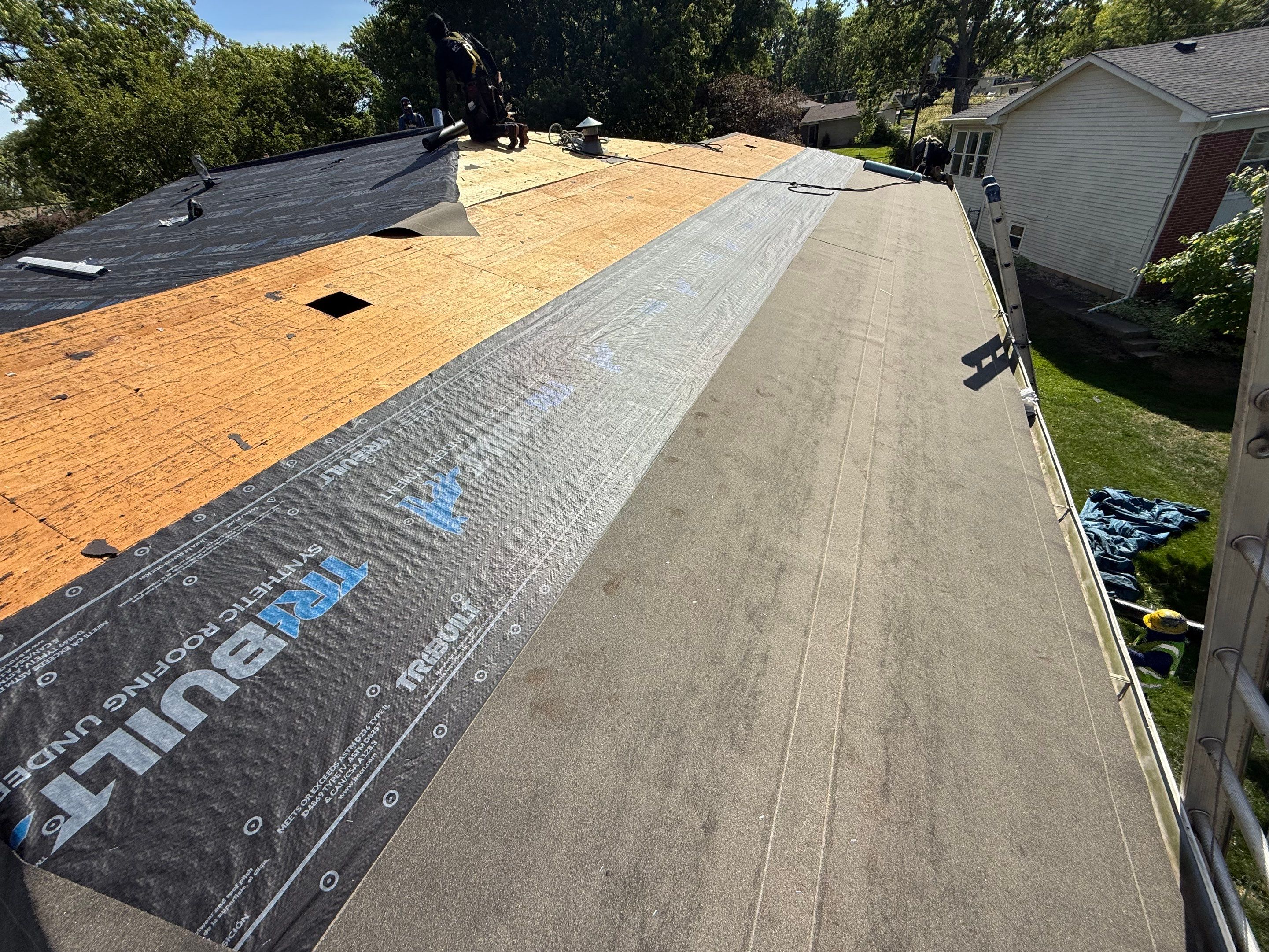 Roofing with GAF and gutters by Optimal Home Improvement 