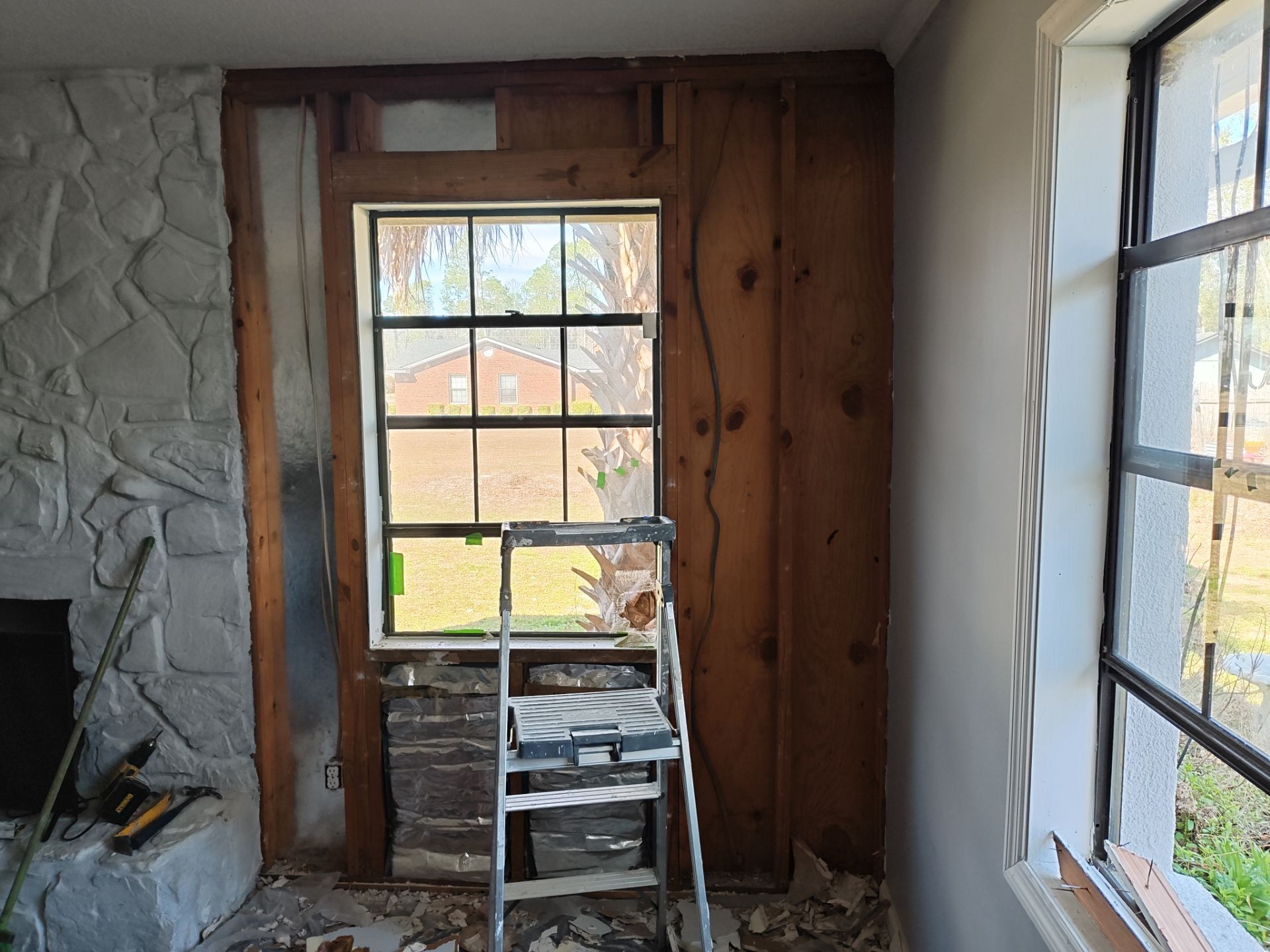 Interior Renovation Featuring Stone Fireplace and Subfloor Restoration in Valdosta by Trinity General Contracting Pros