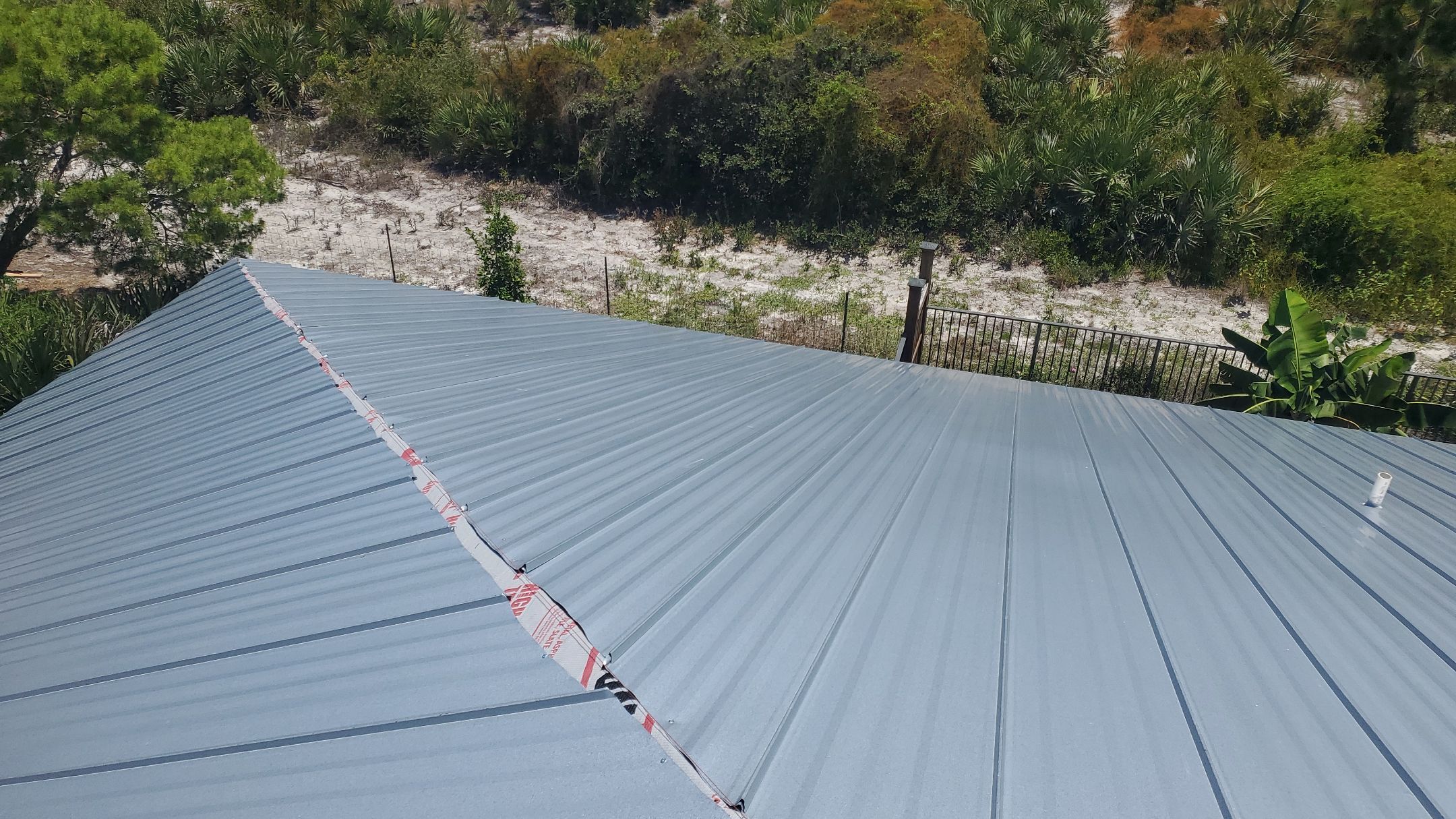 Standing Seam Metal Roof Replacement by Sailfish Roofing