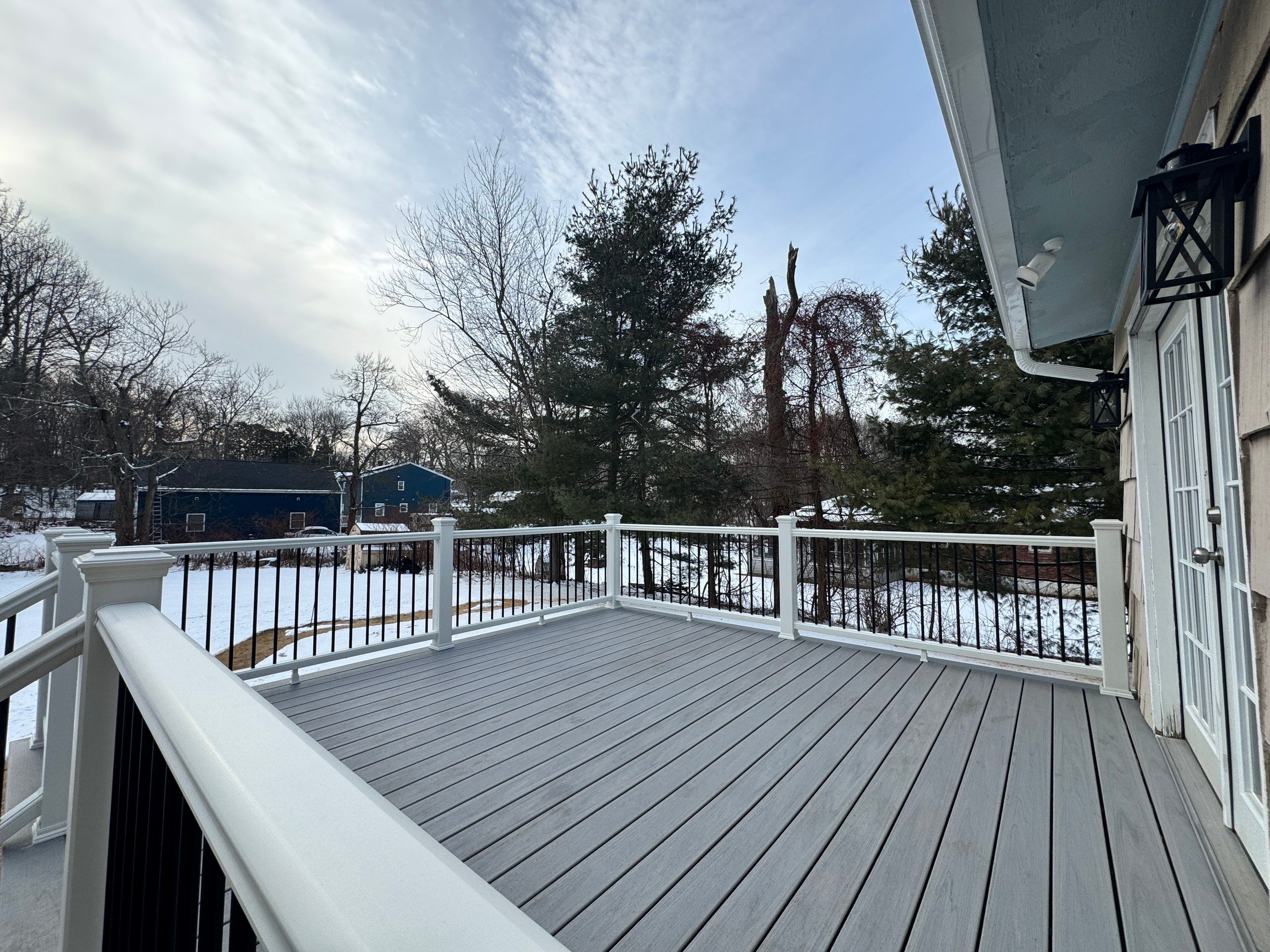Deck replacement using Trex Lineage Rainier , and Transcend White railing.  by DiGiorgi Roofing and Siding Inc